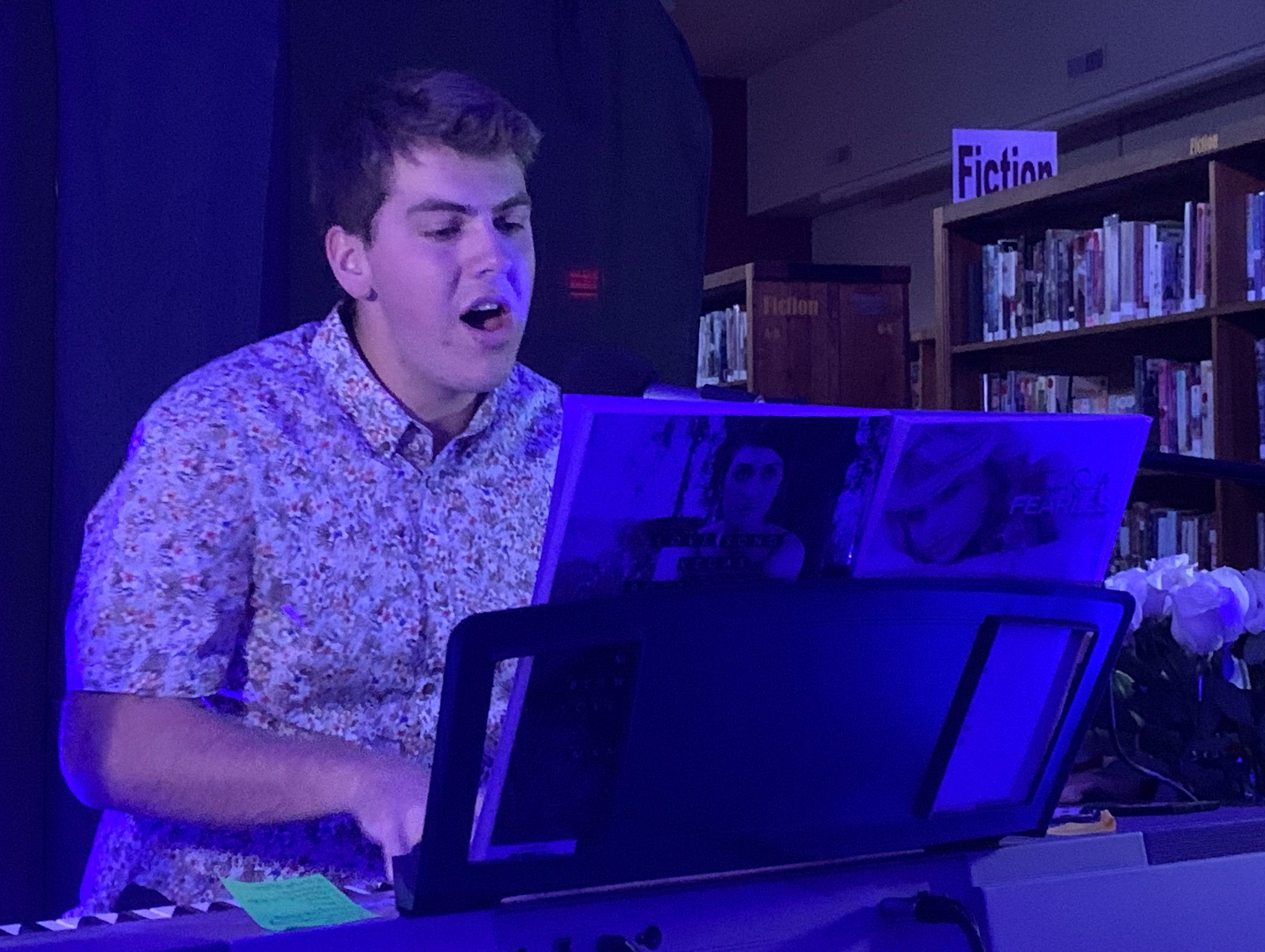Max sings at the piano
