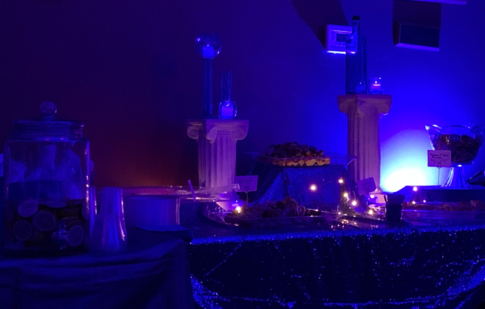 display of food with blue glass decor