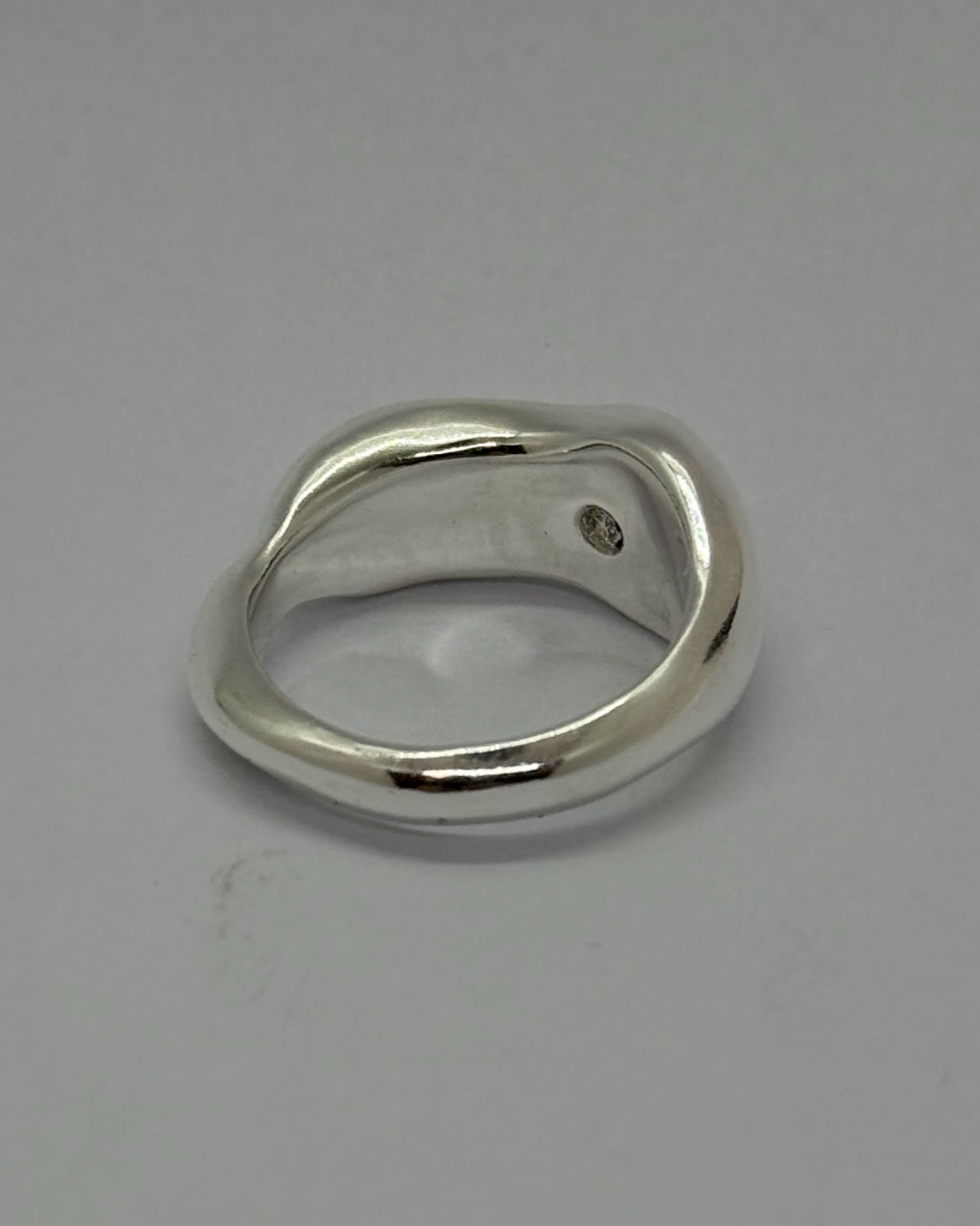 FLUID ENGAGEMENT RING WITH HIDDEN LAB DIAMOND