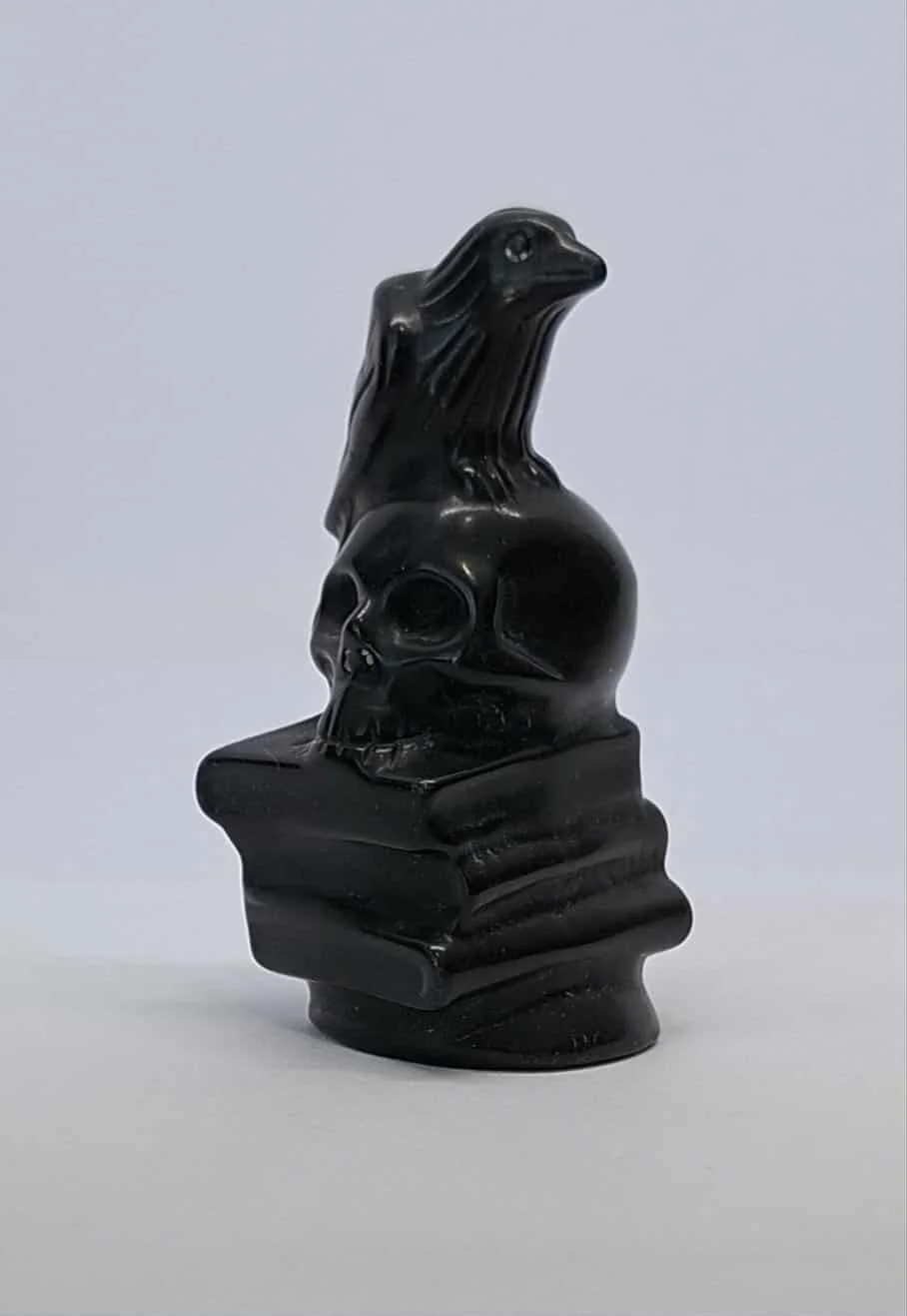 Black Obsidian Raven on skull & books