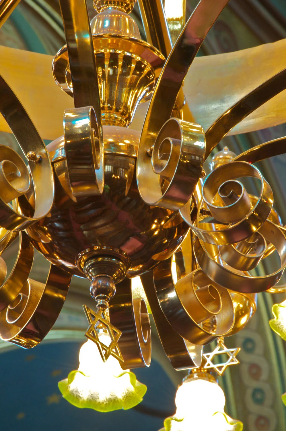 Detail of the restored brass finish of the chandelier