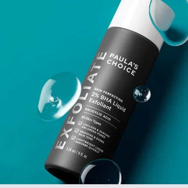 Paulas Choice Exfoliant on blue background