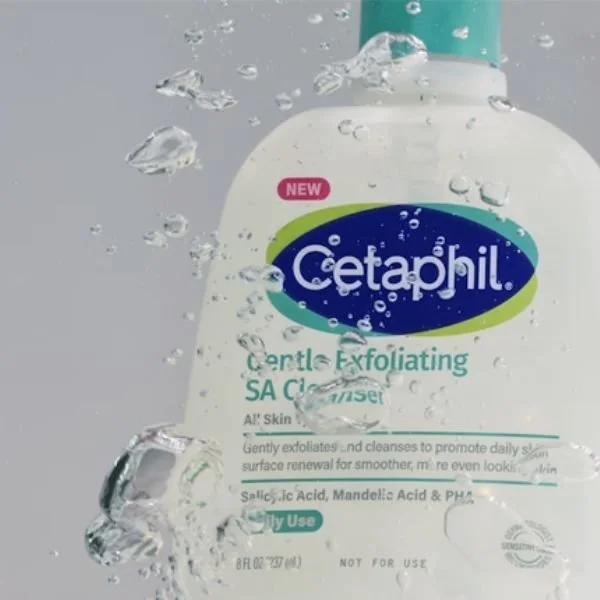 Cetaphil cleanser with water splashing on it