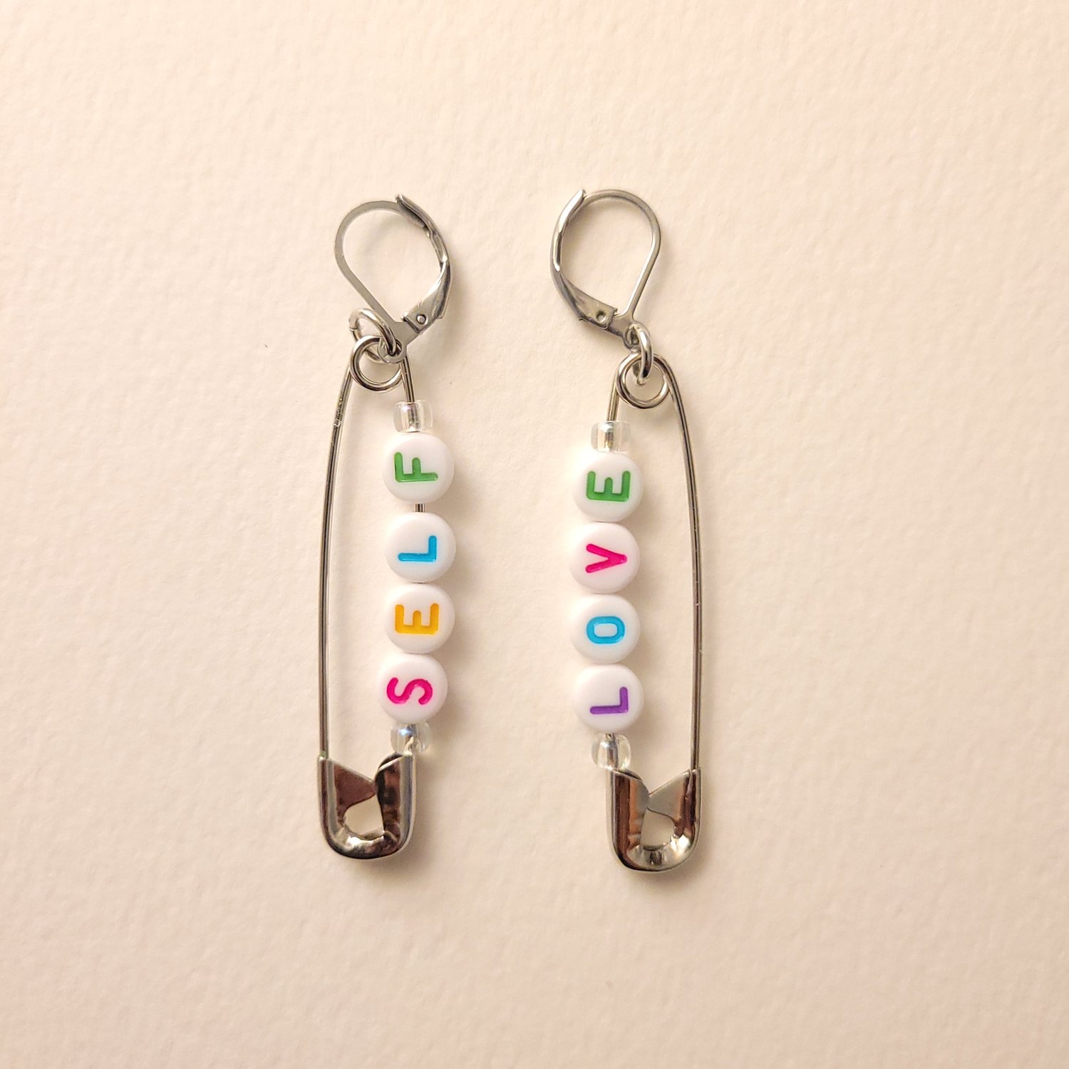 self love safety pin earrings