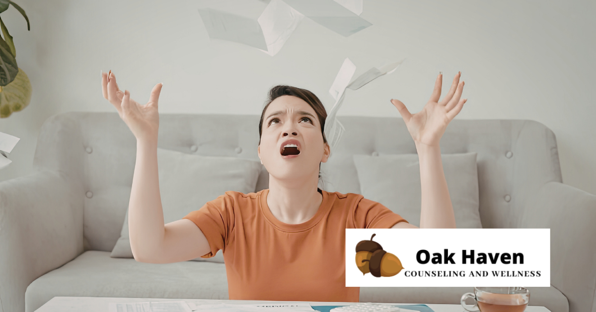 An exacerbated woman throws papers in the air, light colored couch in the background