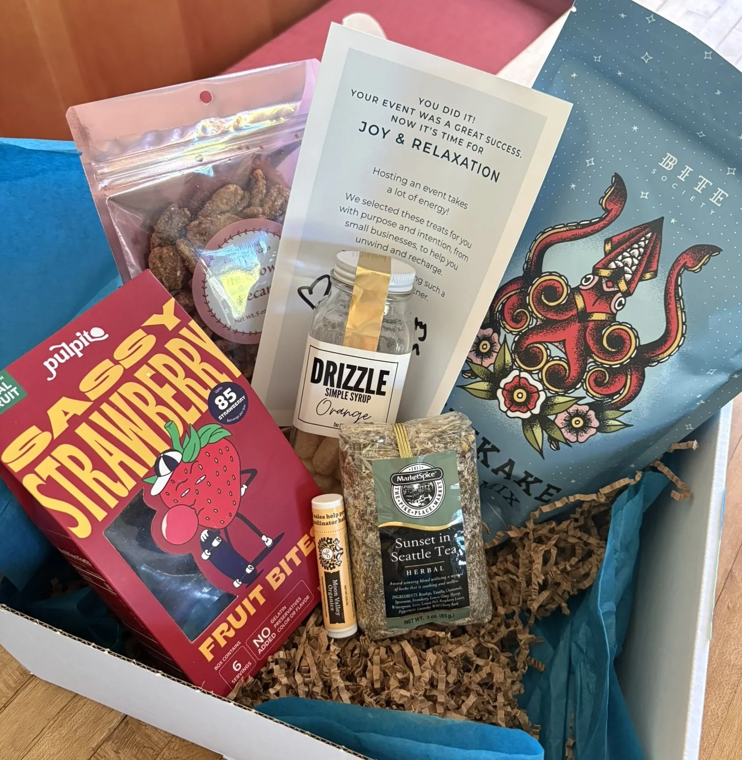 A box with filled with assorted products for self-care.