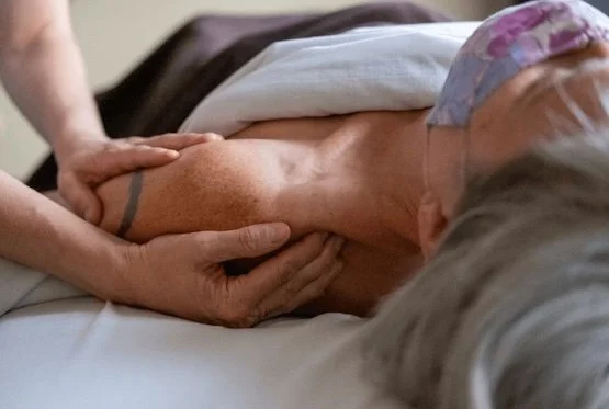 client receiving gentle myofascial release therapy in SoDo, Seattle