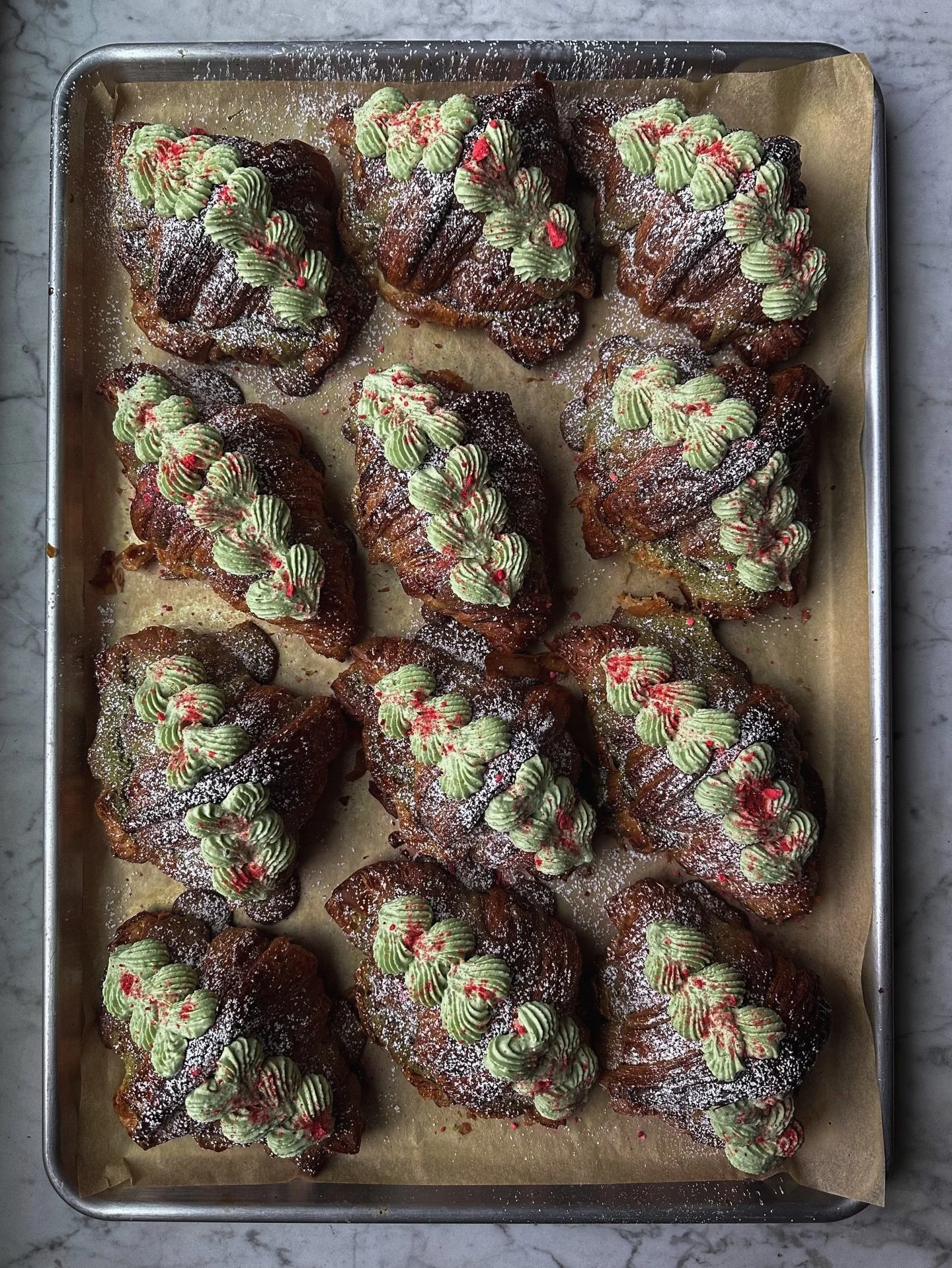Matcha is having a moment right now in the baking world and we are here for it.  Put us in, coach!
.
*Strawberry Matcha Twice-Baked Croissant*:
Filled and baked a second time with almond-matcha frangipane + strawberry jam and a strawberry syrup soak.