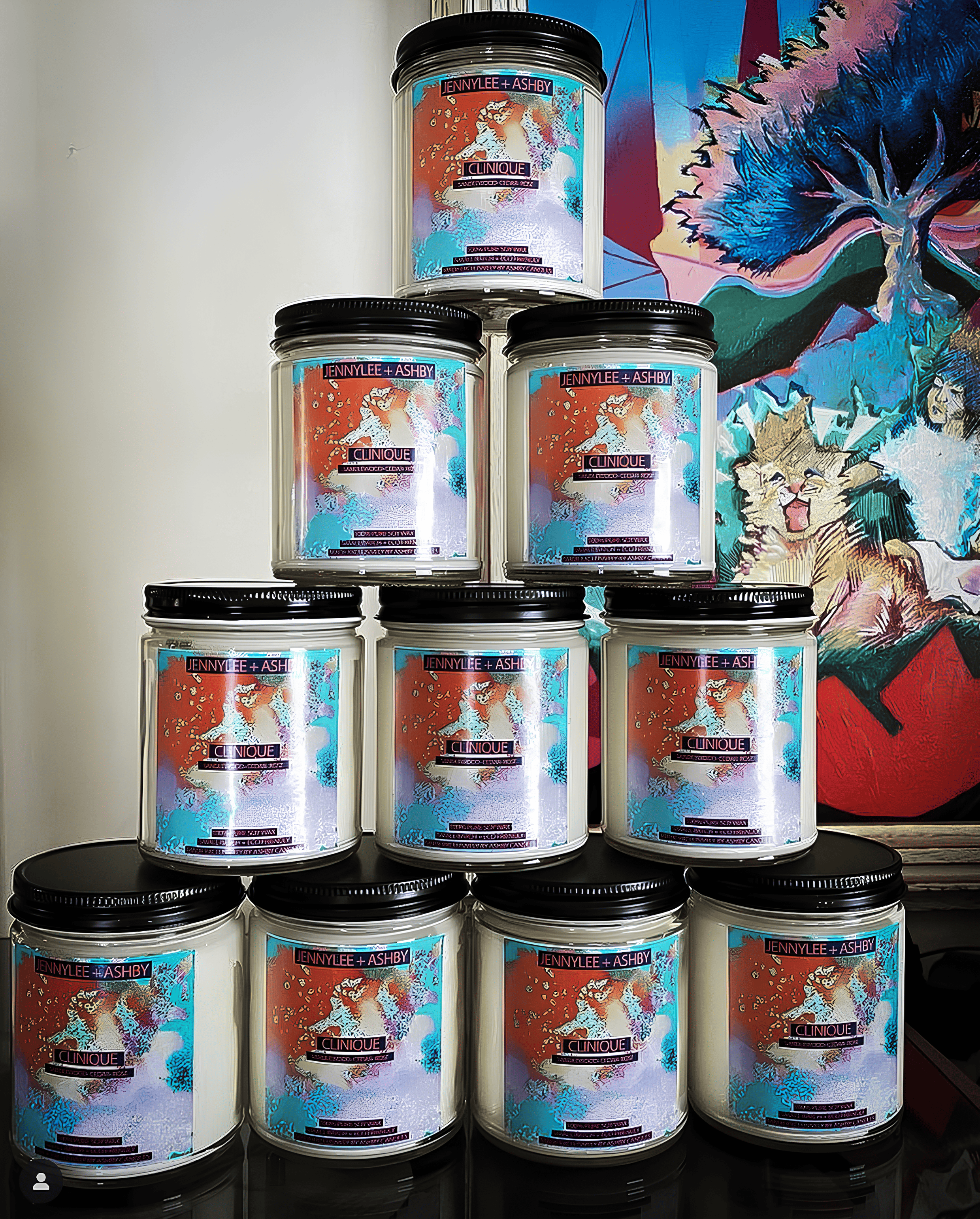 trio of candles showing labels and album art design