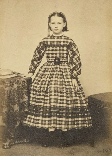 Young girl in 1850s clothing