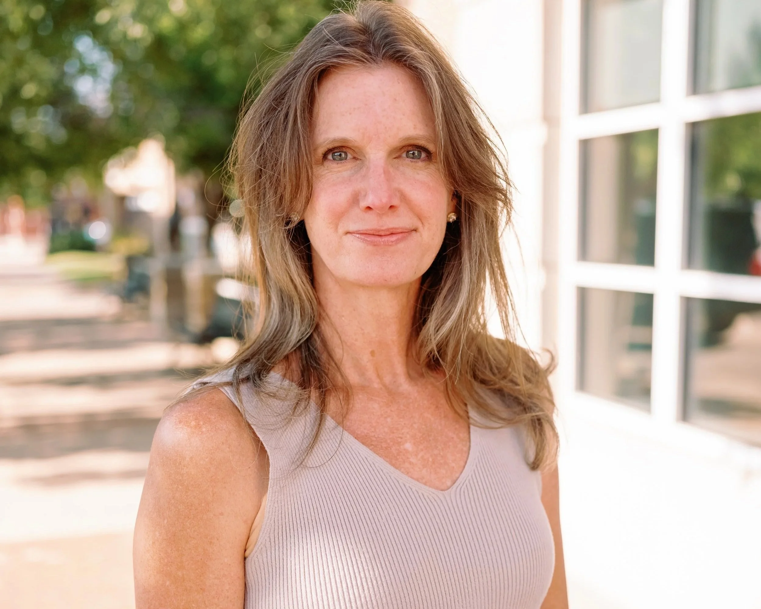 headshot of ushine founder, jenn winton