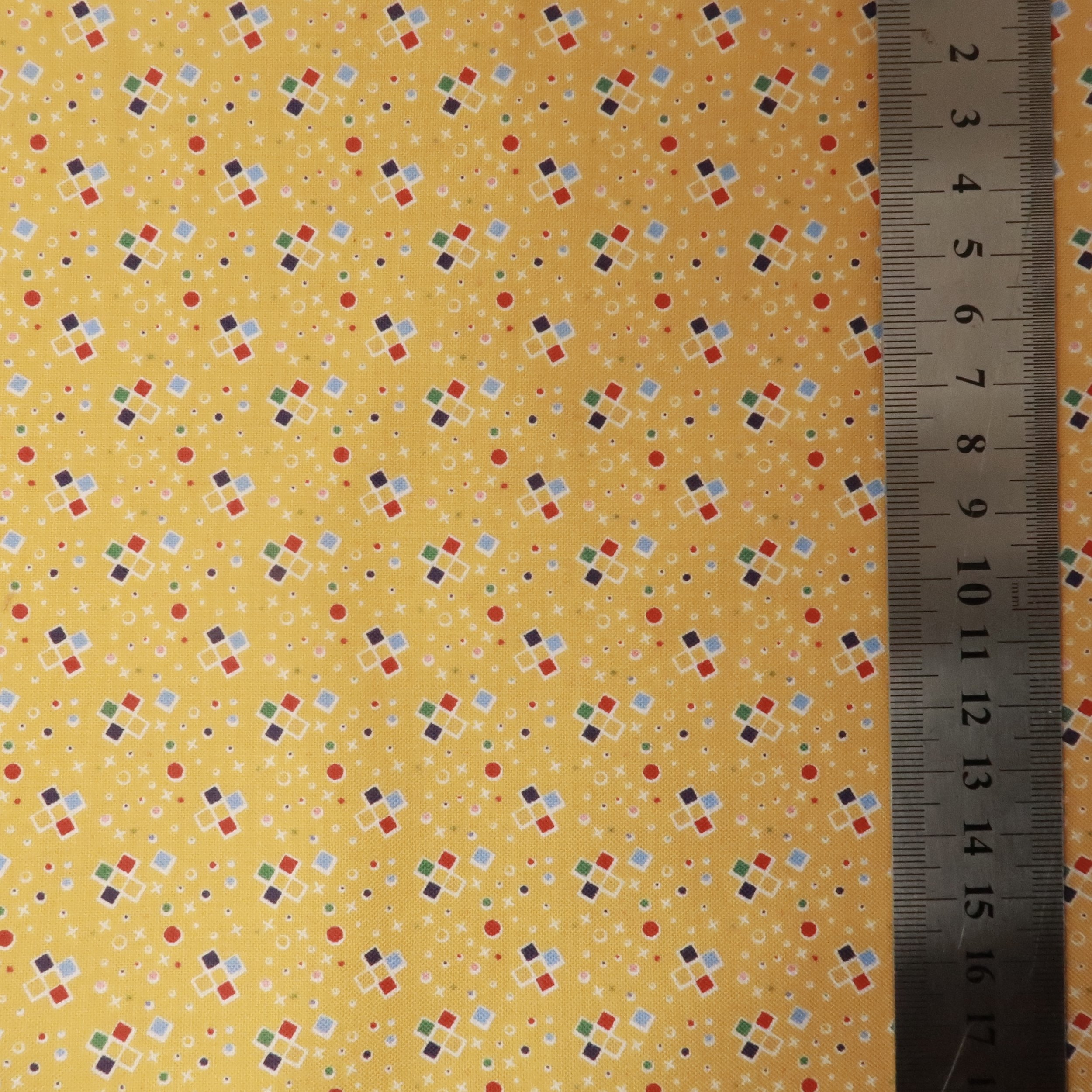 Retro multi squares on yellow fabric