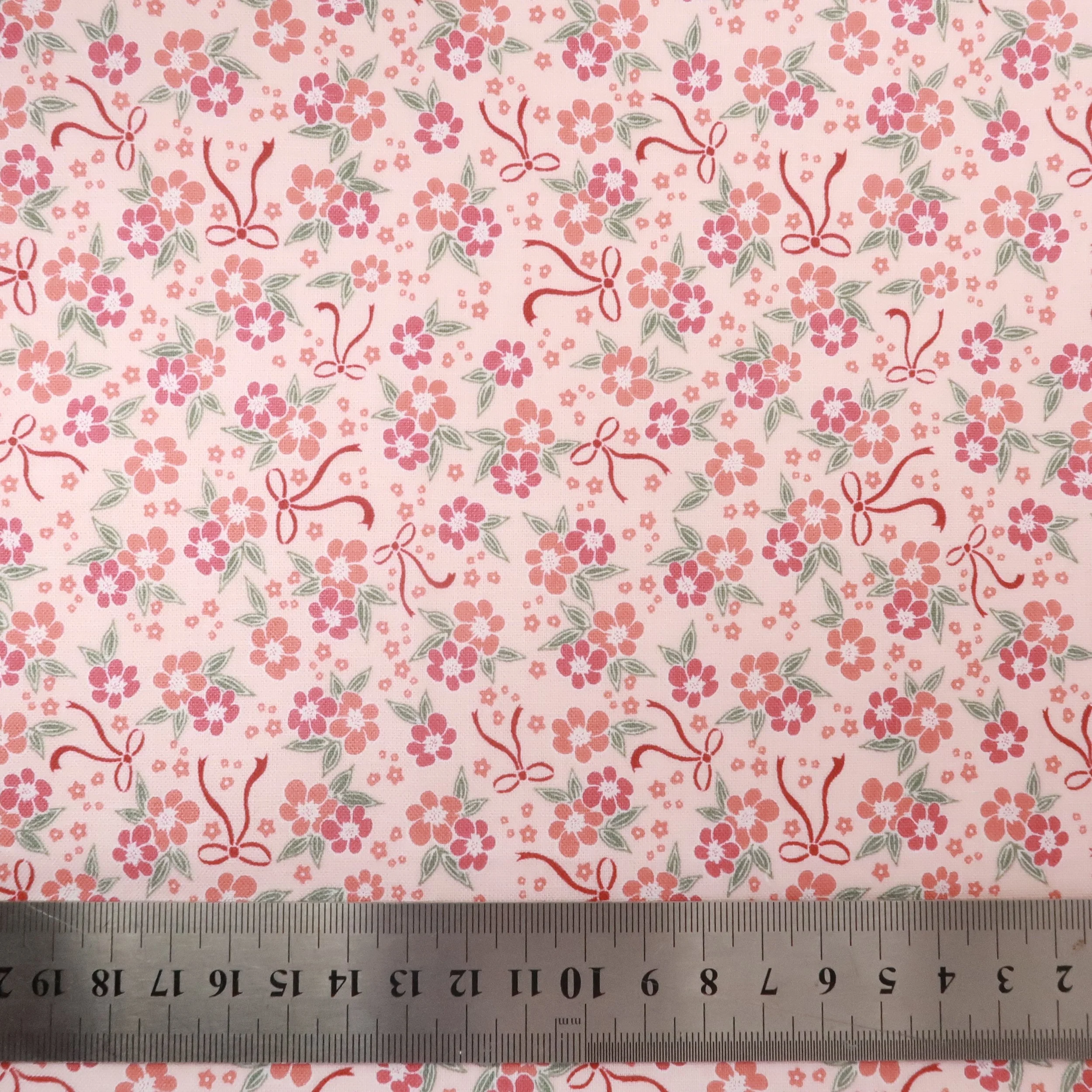 Coral pink posies on pink fabric