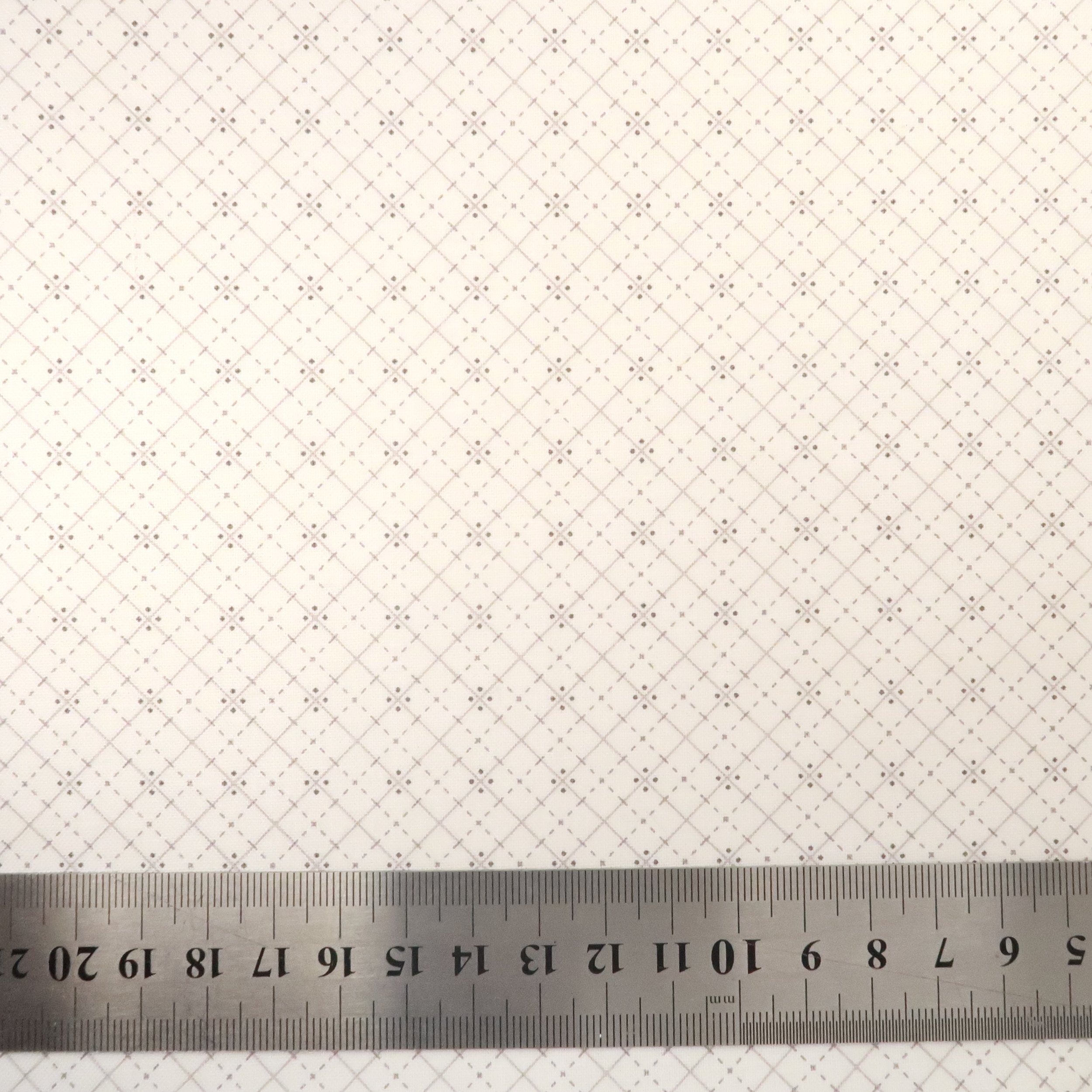 Taupe plaid and dots on off-white fabric