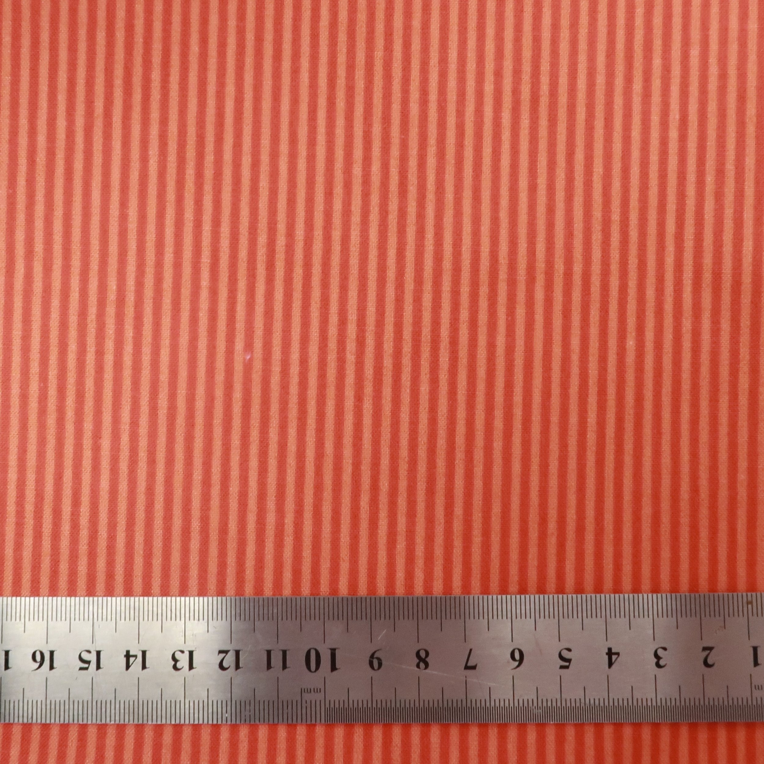 Red on pink stripe fabric