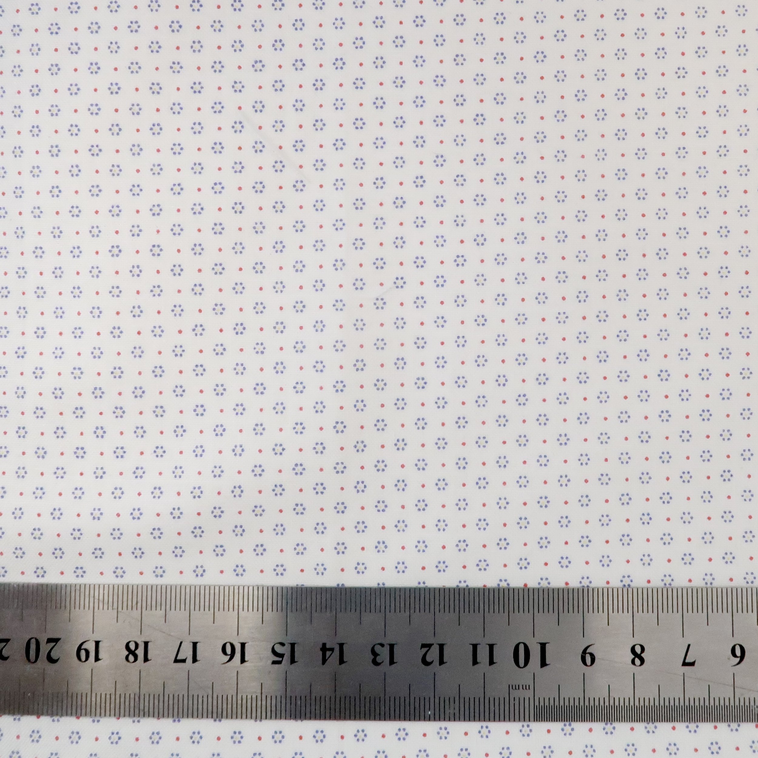 Tiny dot wreaths on white fabric