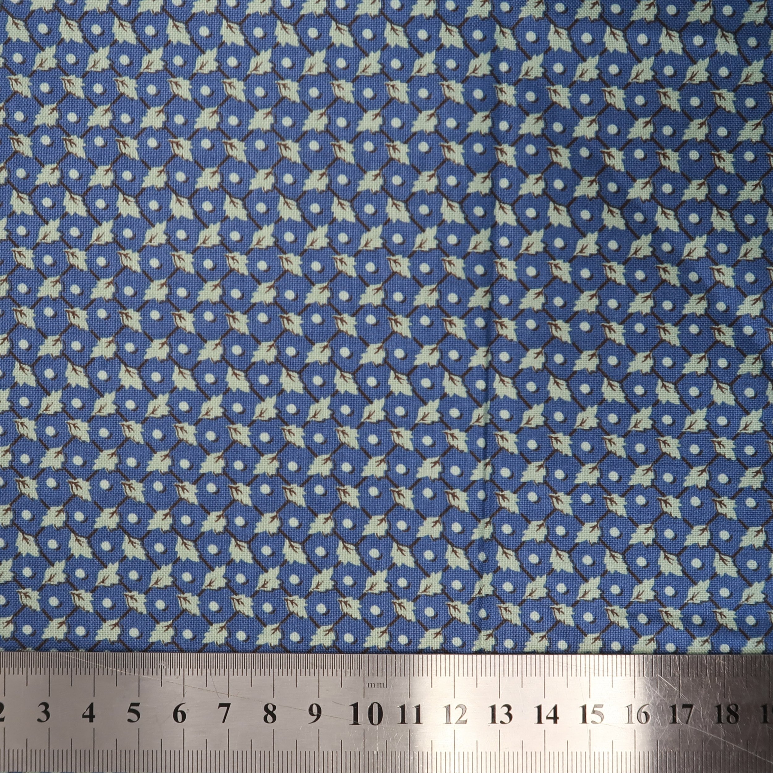 Blue with mint leaves on lattice fabric