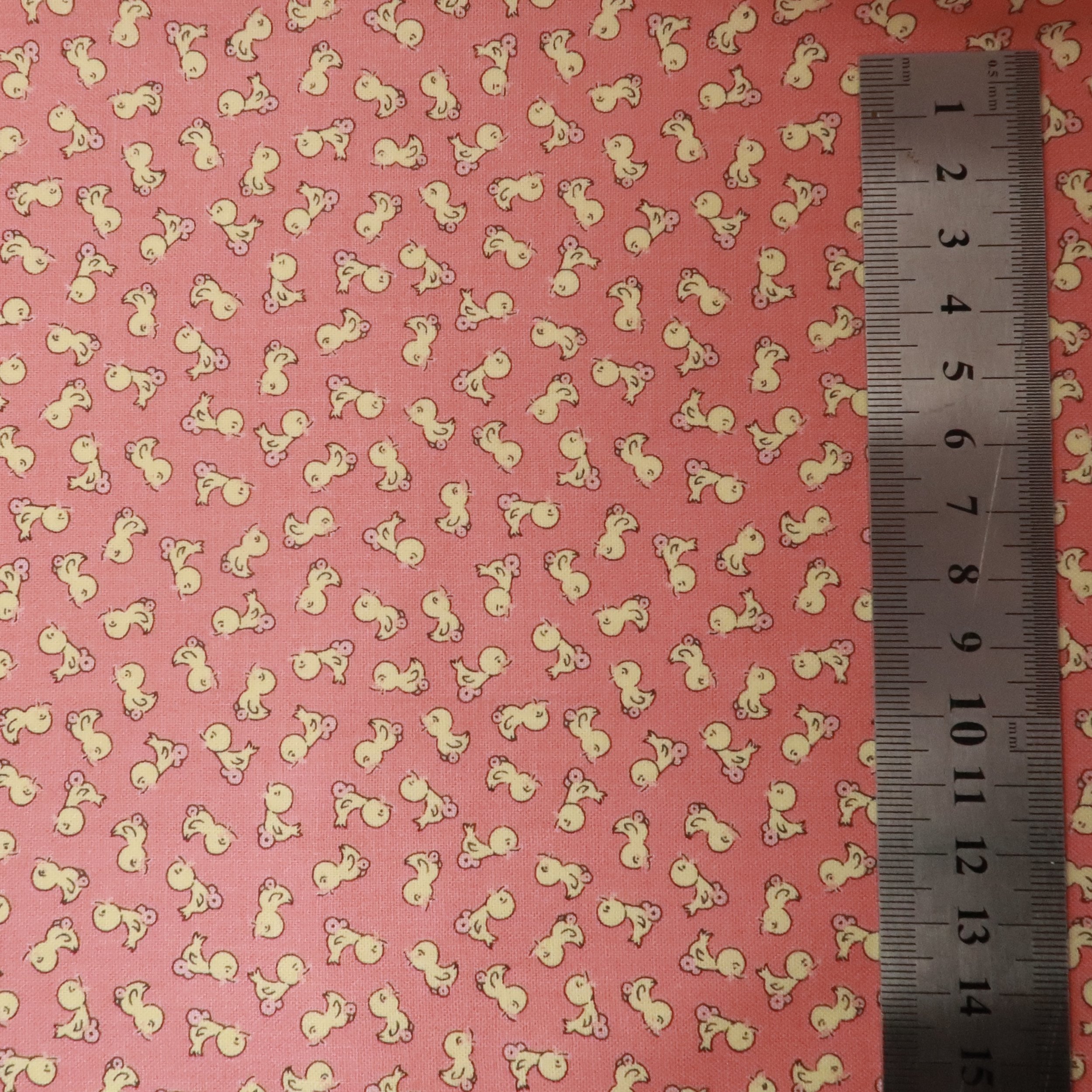 Vintage 1930s ducks on coral pink fabric