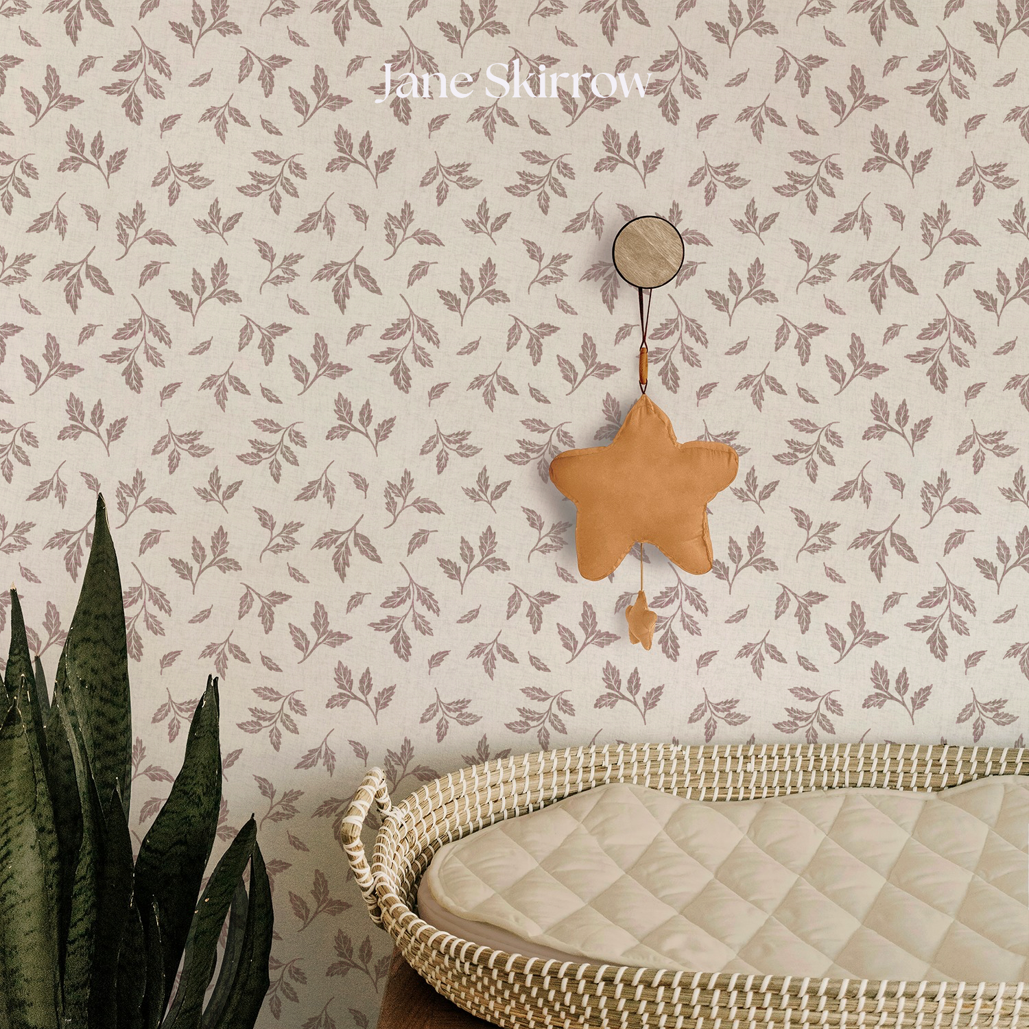 baby nursery with botanical wallpaper