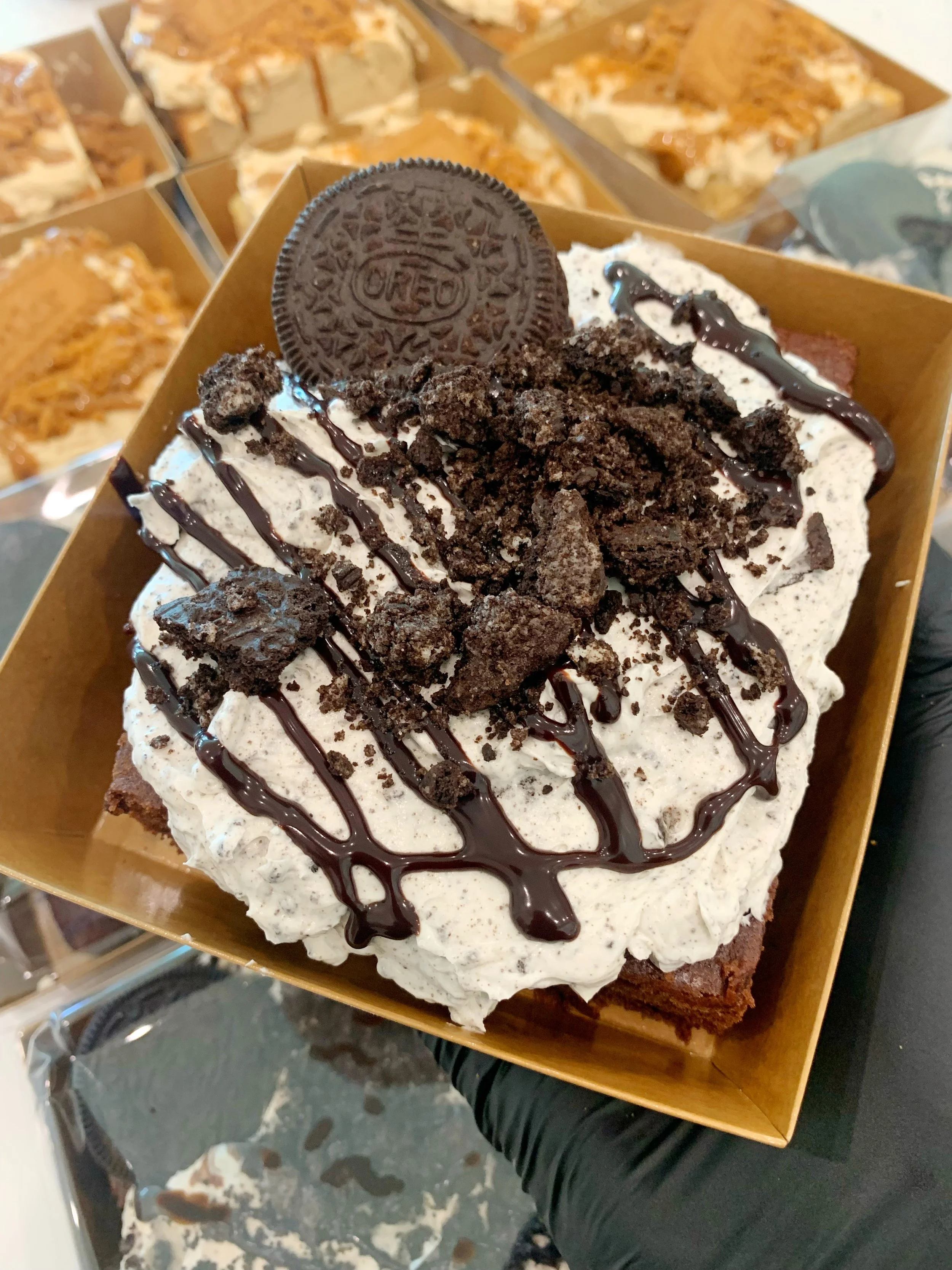cookies and cream cake cut into slices