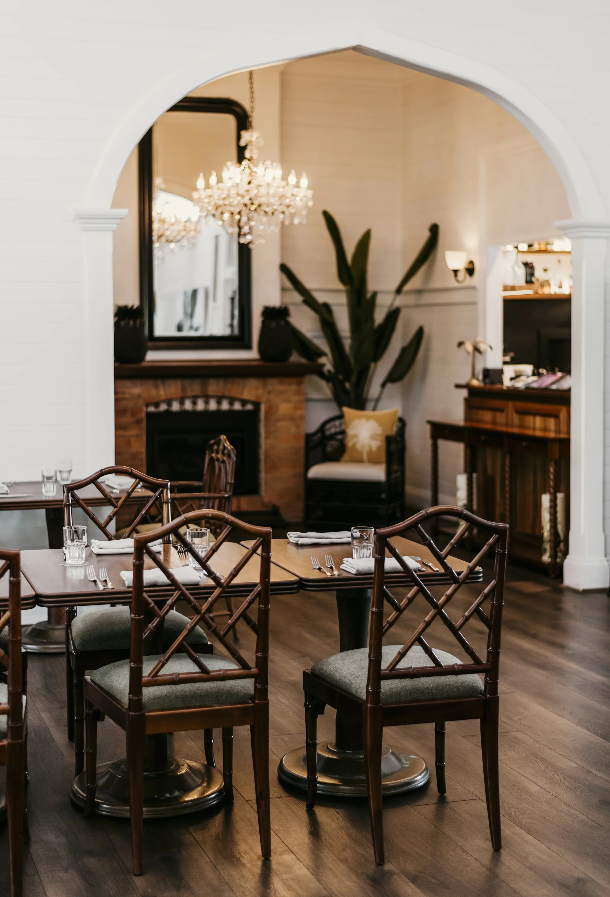 interior dining room with fireplace and chandelier