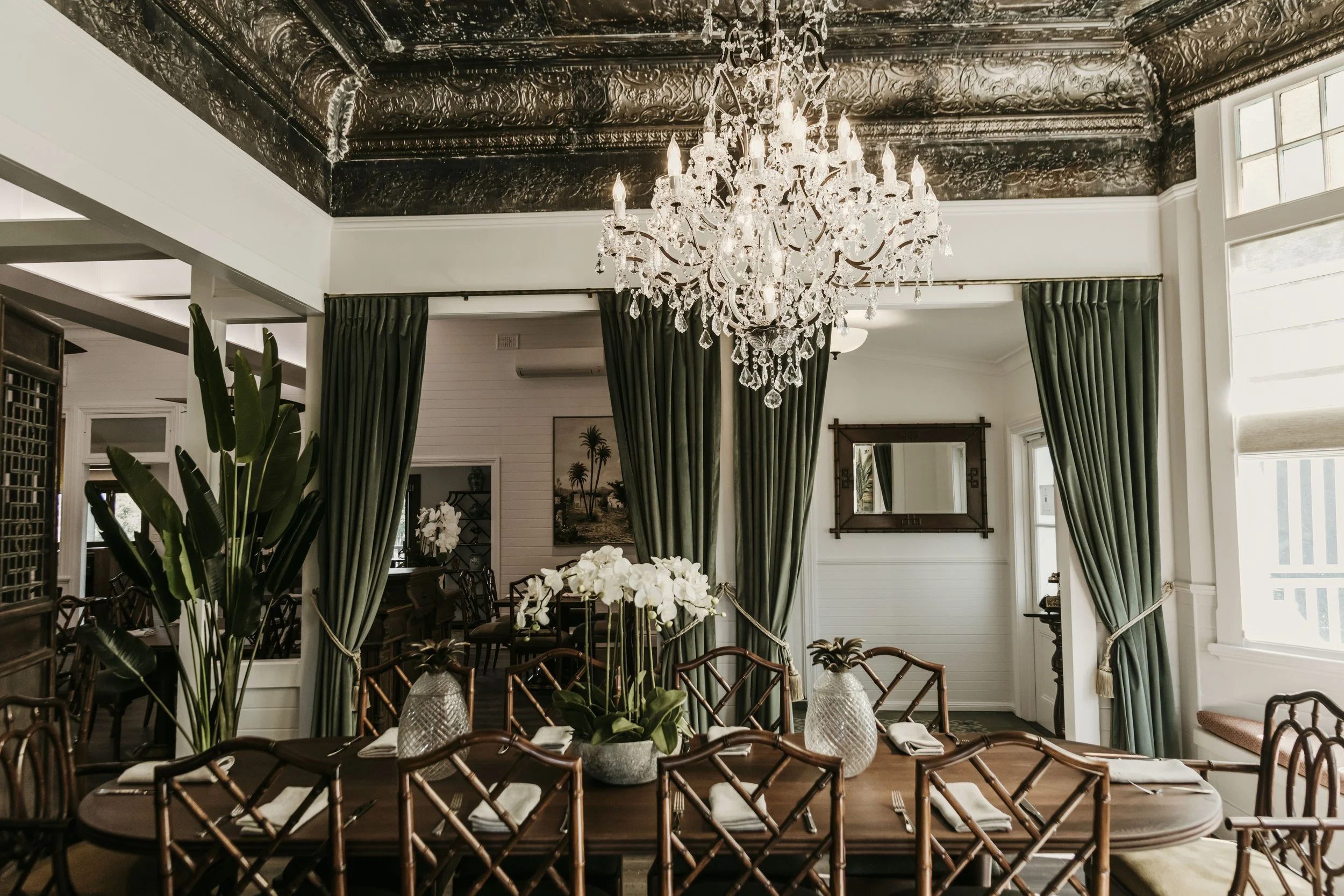 Private dining room with chandelier above table