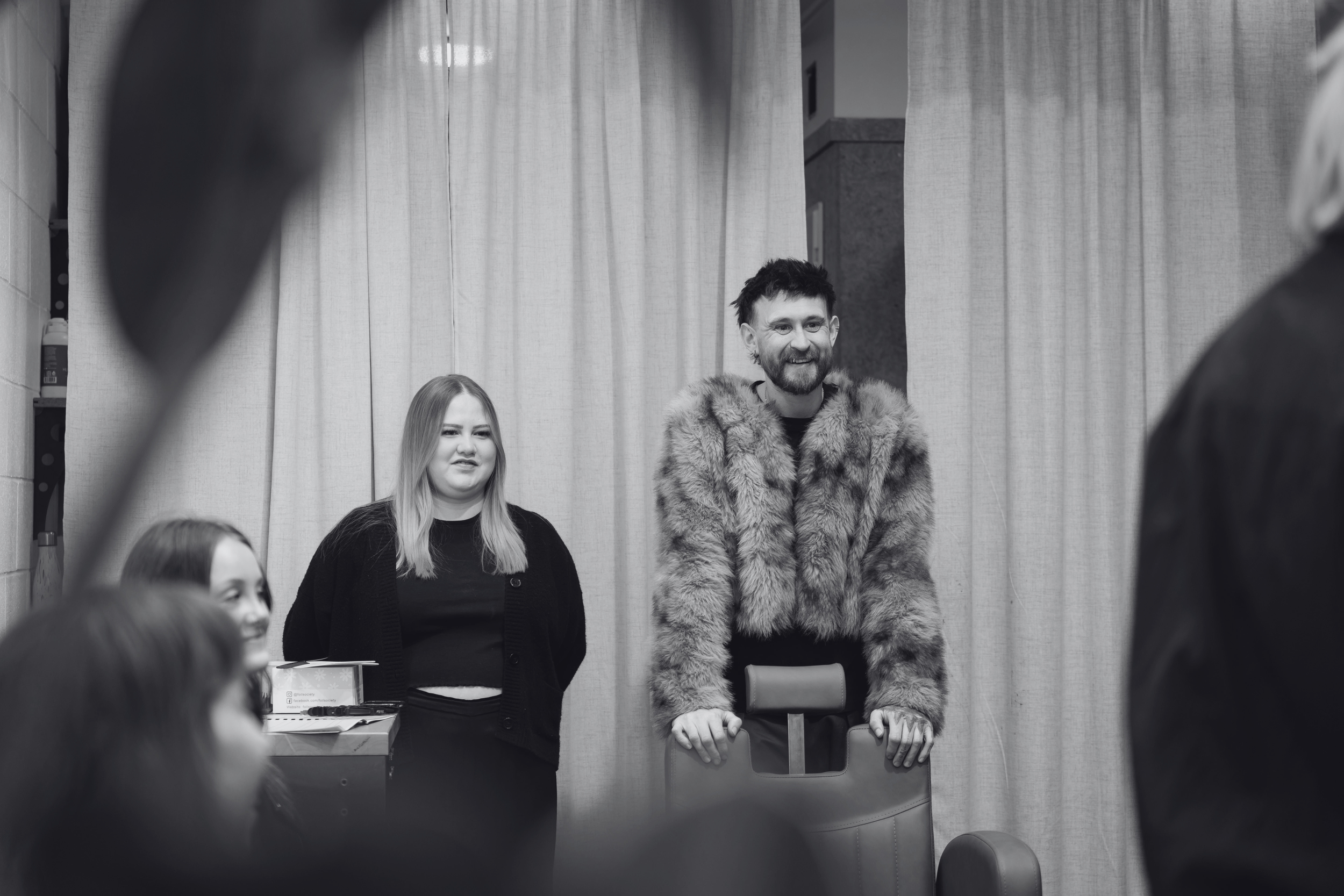 Aroha on right, Andy on left smiling at attendees of the last Highlift Tint 101 class