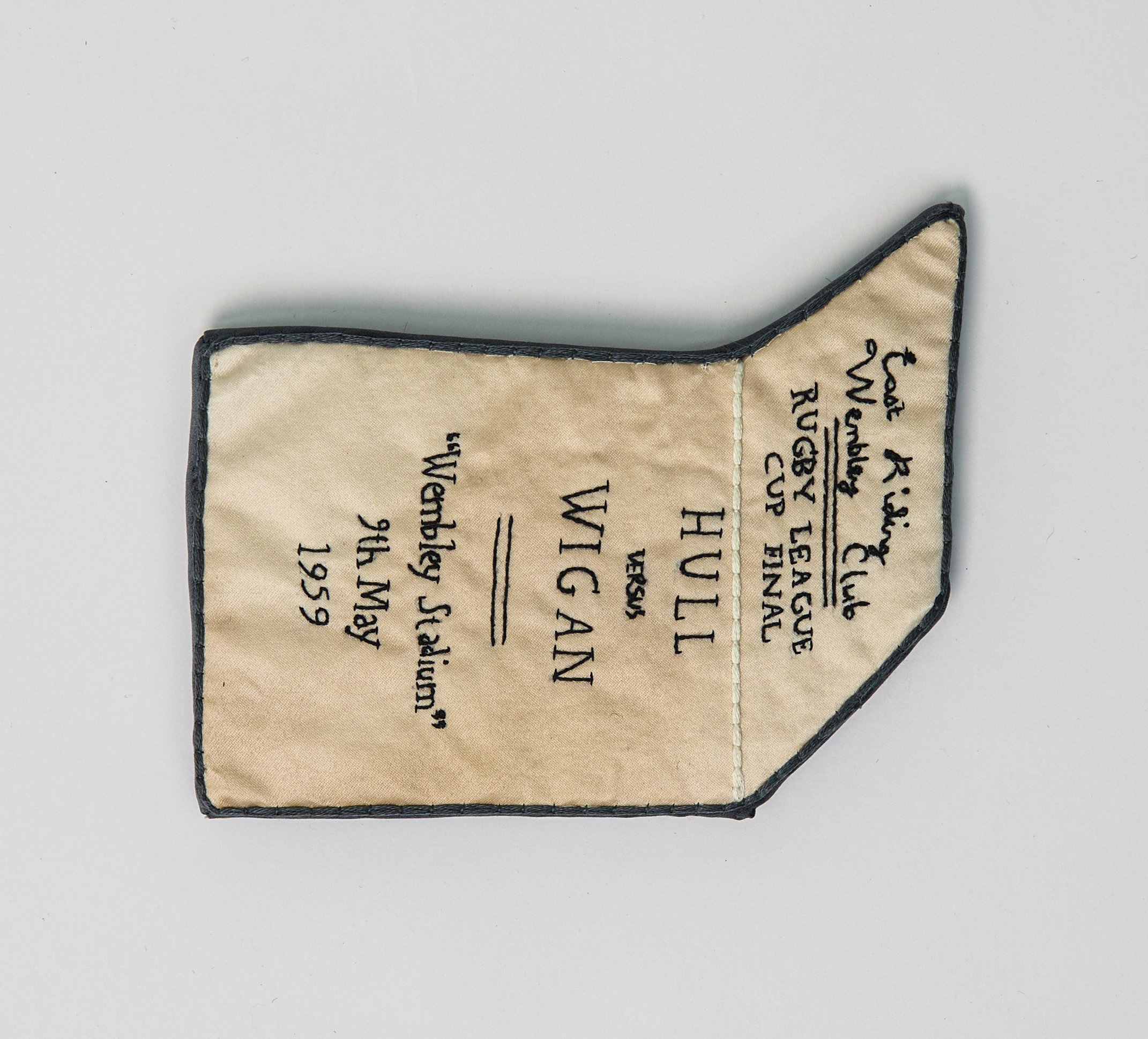"Grandad's Rugby Bill" (2025), hand-embroidered silk and other textiles, 12cm x 14cm x 1.5cm, £150