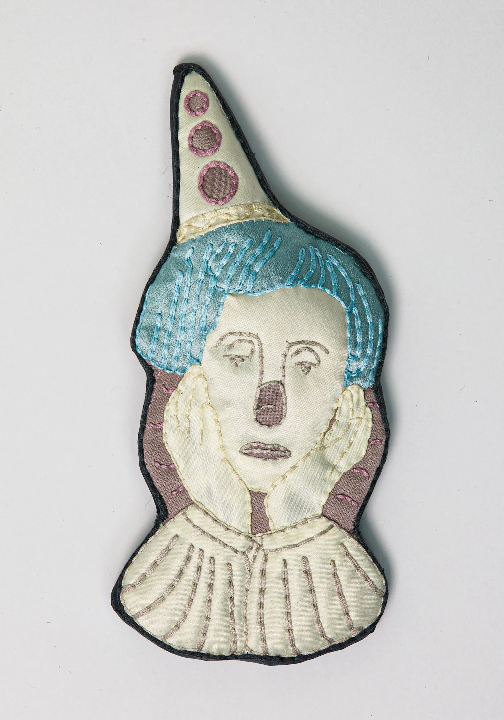 "Lost Sad Clown" (2025), hand-embroidered silk and other textiles, 21cm x 10cm x 3cm, £450