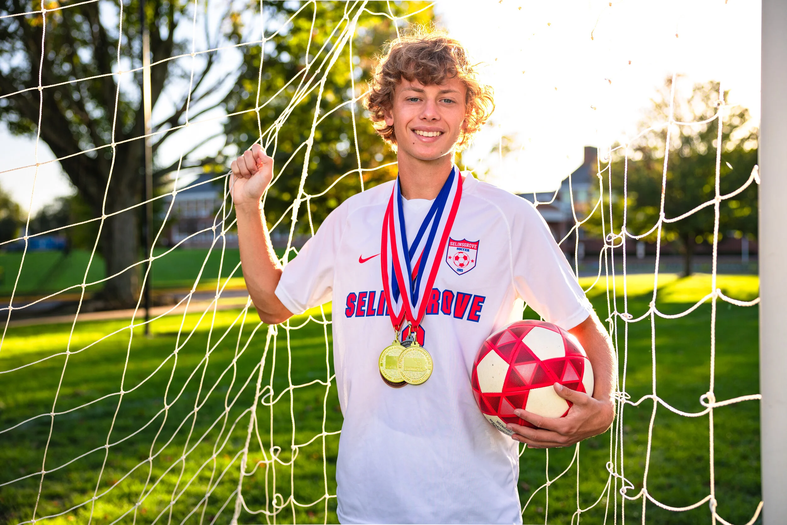 Senior photo taken at Selinsgrove High School soccer field.