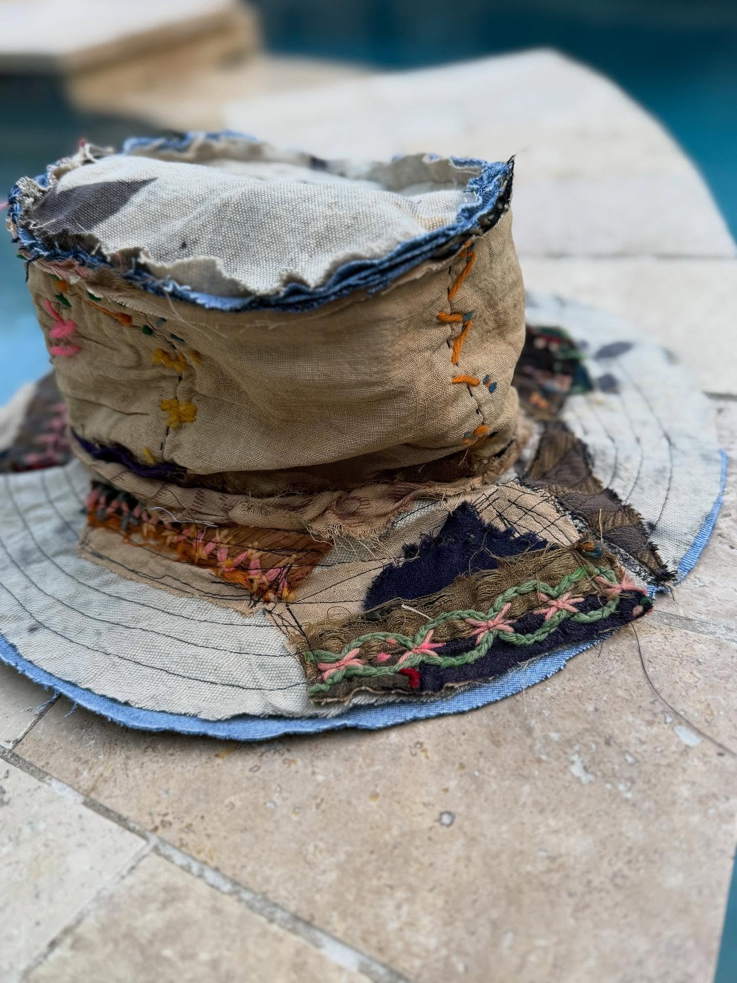 I am in love with this funky distressed reversible hat Om working on. A few final details before it will be ready. 

Featuring vintage quilt paired with my eco dyed fabrics. Then on the reverse a well worn pair of jeans. Yes please!! 

I have one hat