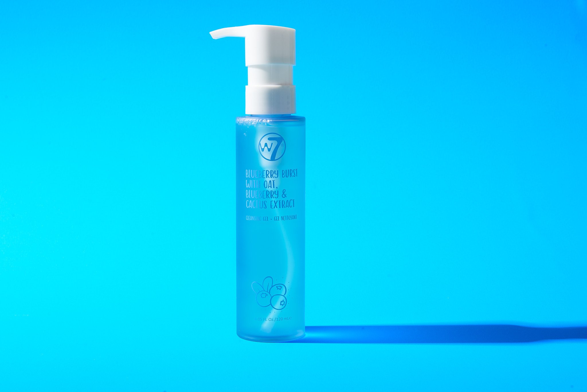 W7 Blueberry Burst face cleansing gel with pump on blue background
