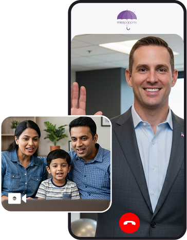 A man in a suit smiling on a video call with a family of three, including a woman, a man, and a young boy, against a plain background with a Mississippians logo at the top.