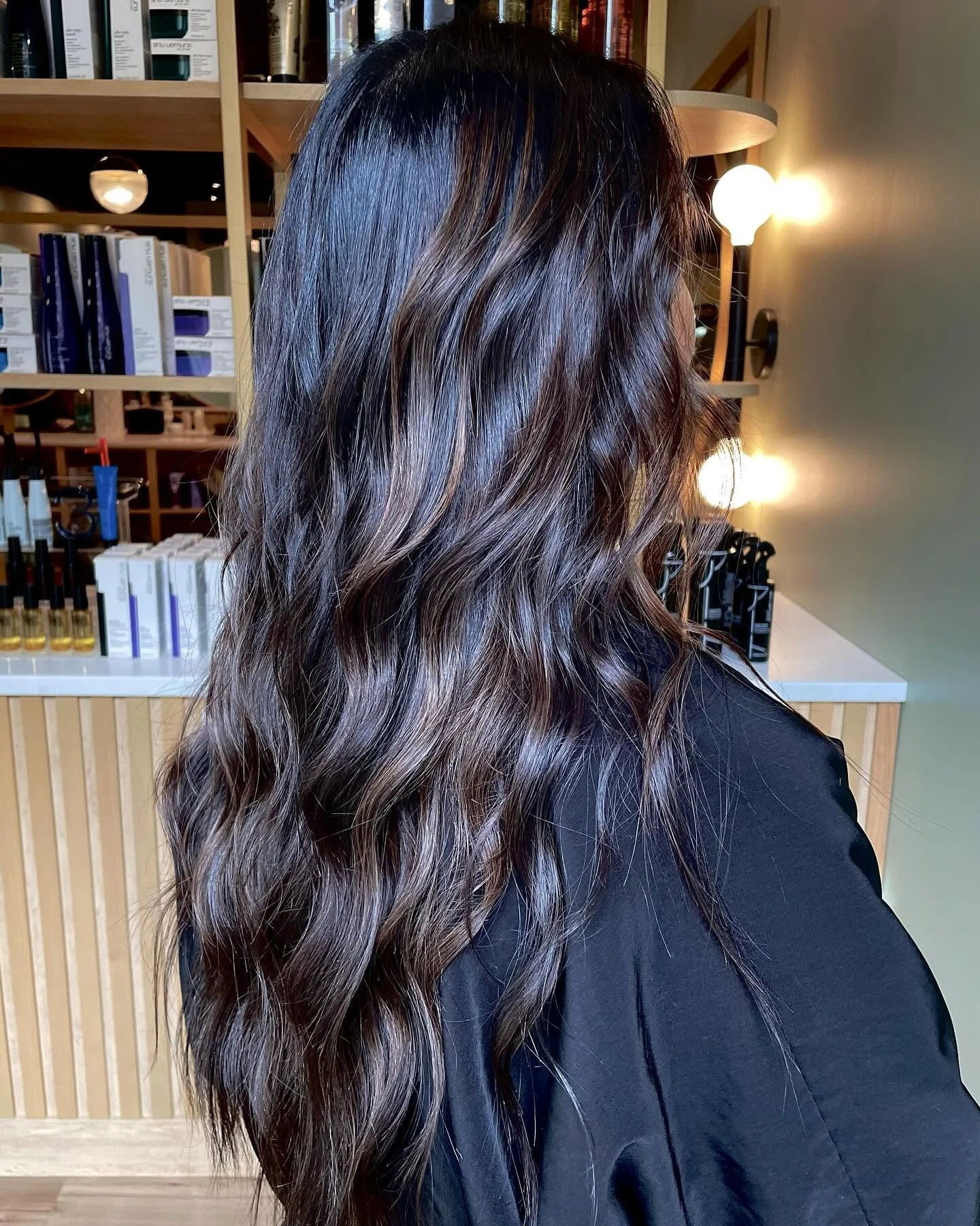 Layered haircut styled at Salon Shiloh in Chicago