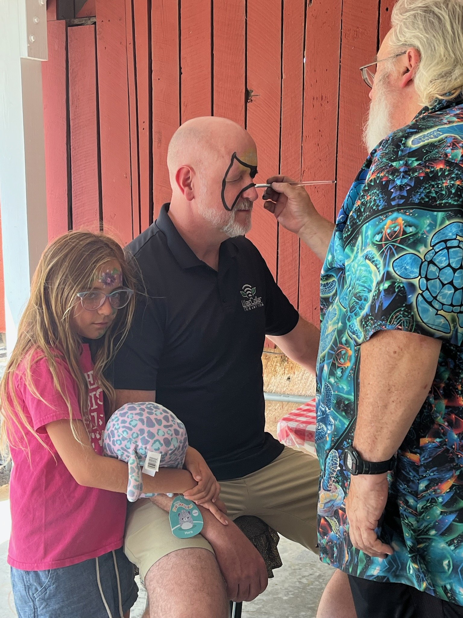 Gene Bransfield getting his face painted