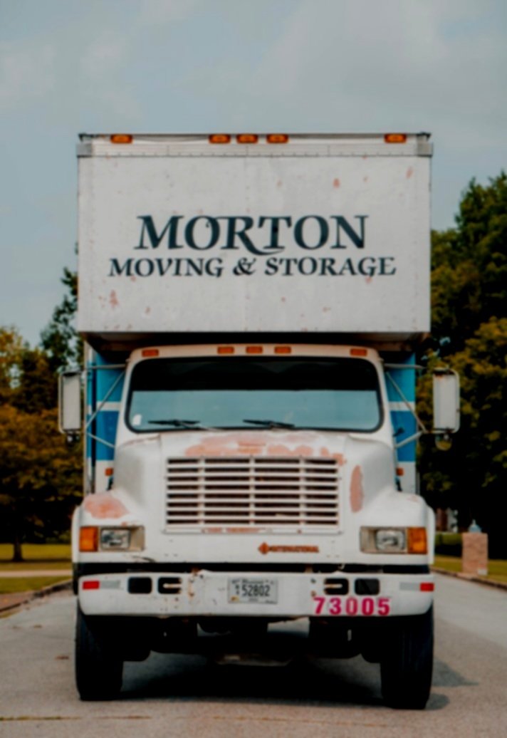 Morton Moving & Storage truck parked on a paved road..jpg