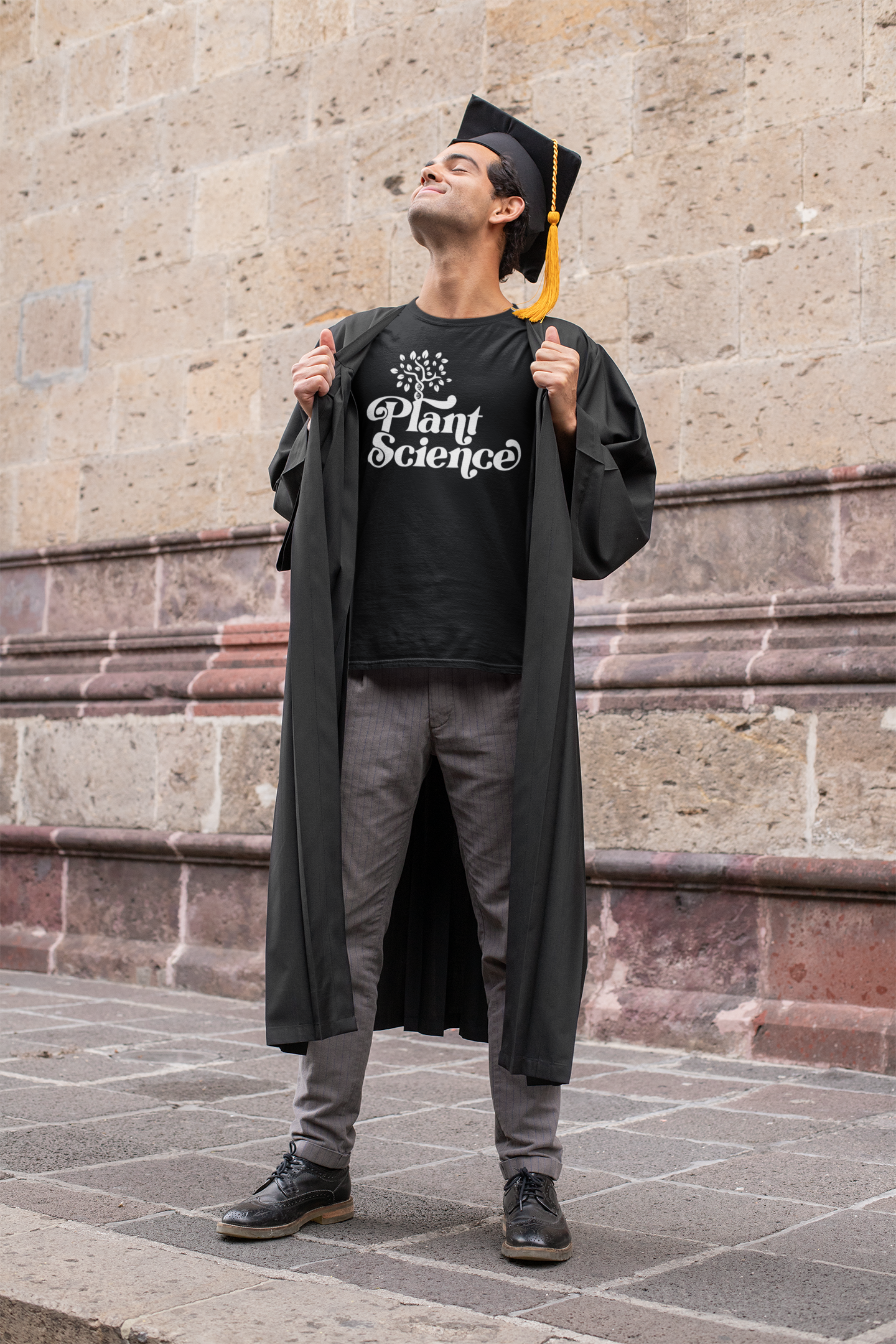 t-shirt-mockup-featuring-a-proud-young-man-wearing-a-graduation-gown-32629.png