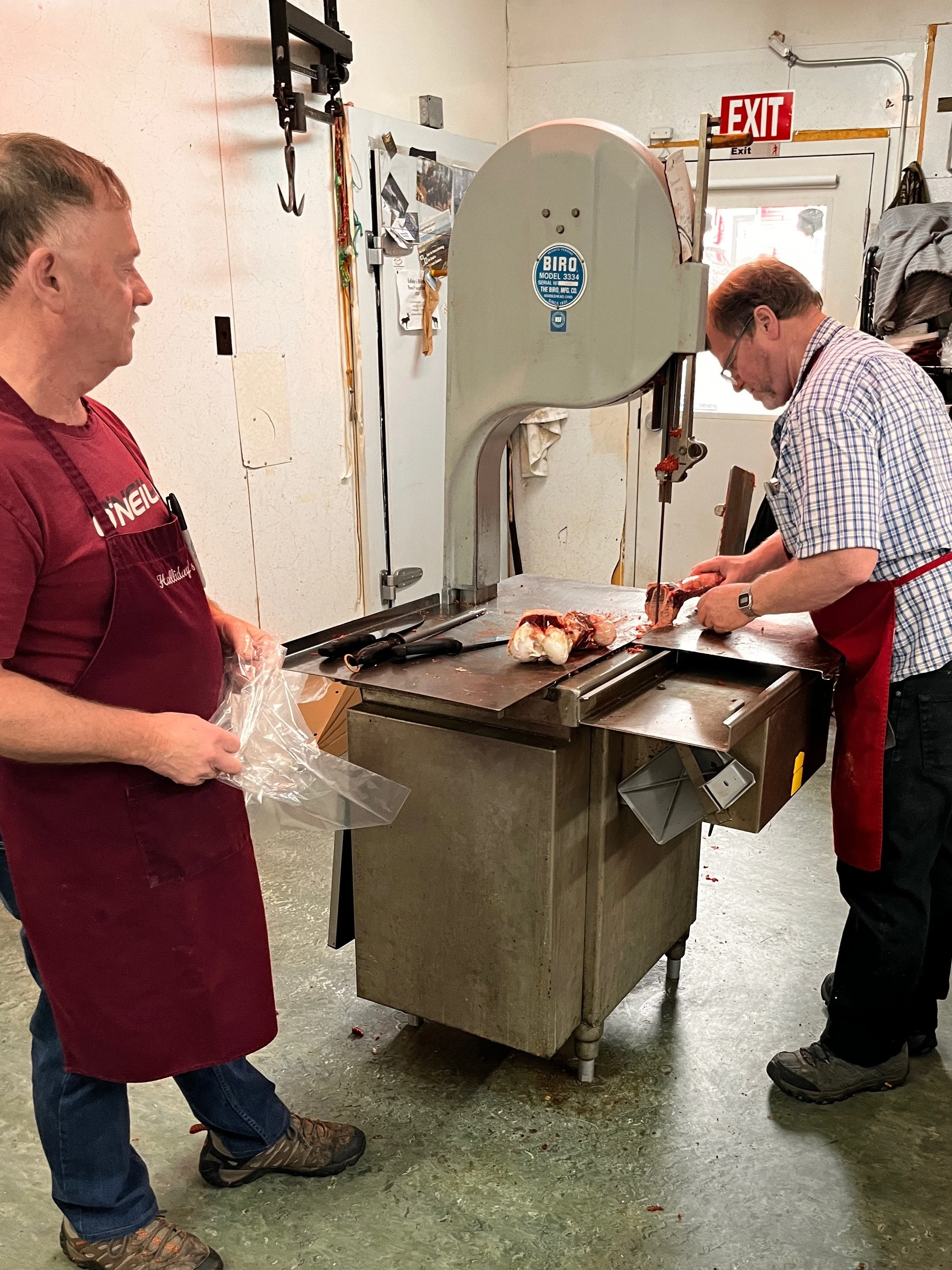 Haliday's Butcher Shop Crew splitting my moose bones.jpg