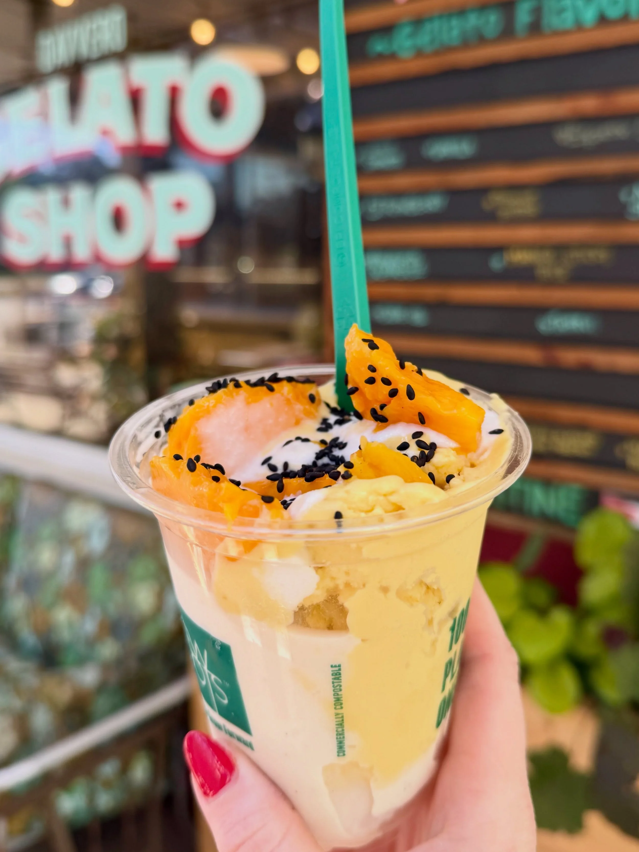 Mango Sticky Rice Sundae: vanilla and mango sticky rice gelato, condensed coconut milk, fresh Alphonso mango and black sesame seeds