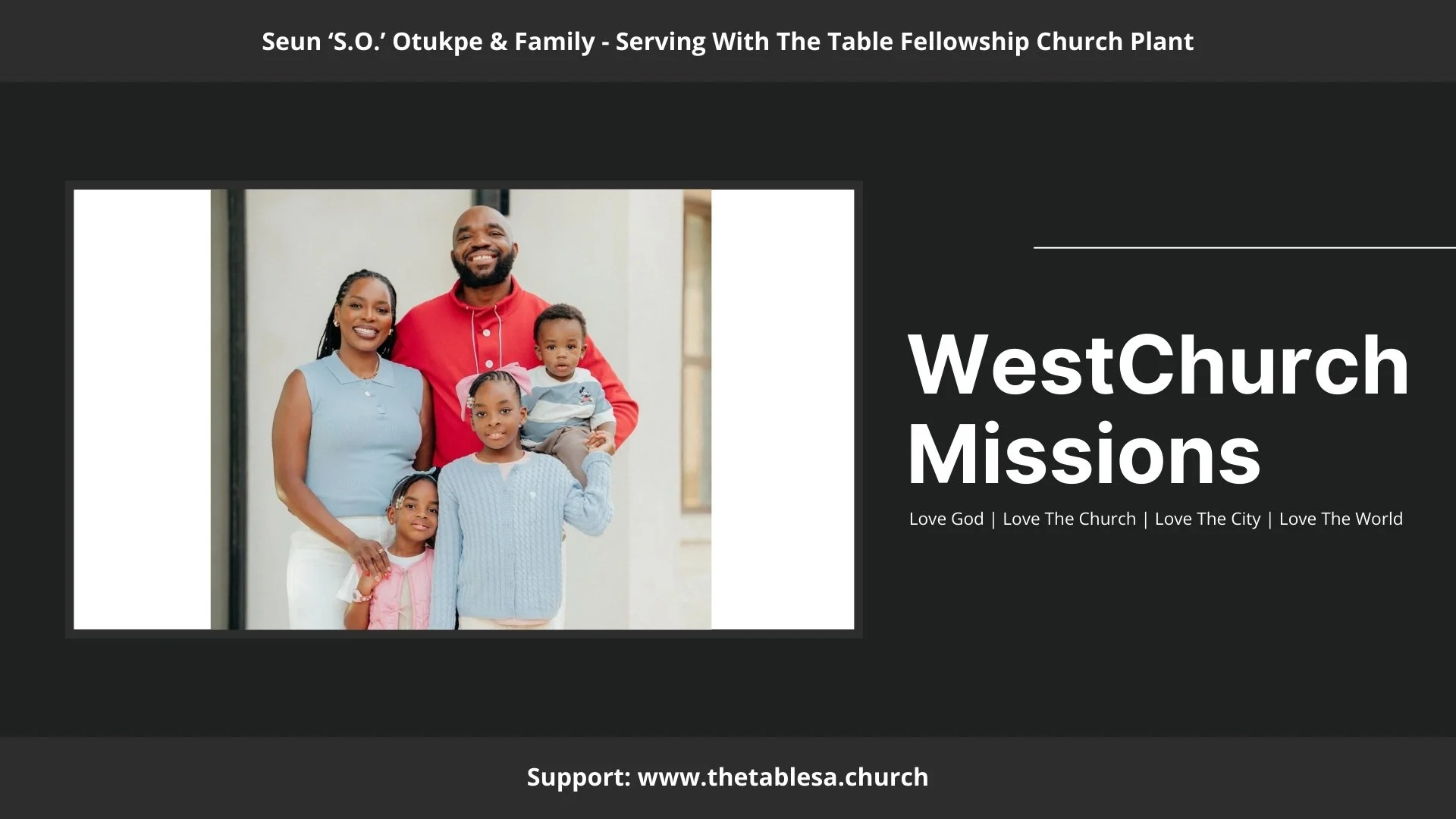 A family of six, including two adults and four children, standing together in front of a church building, smiling.