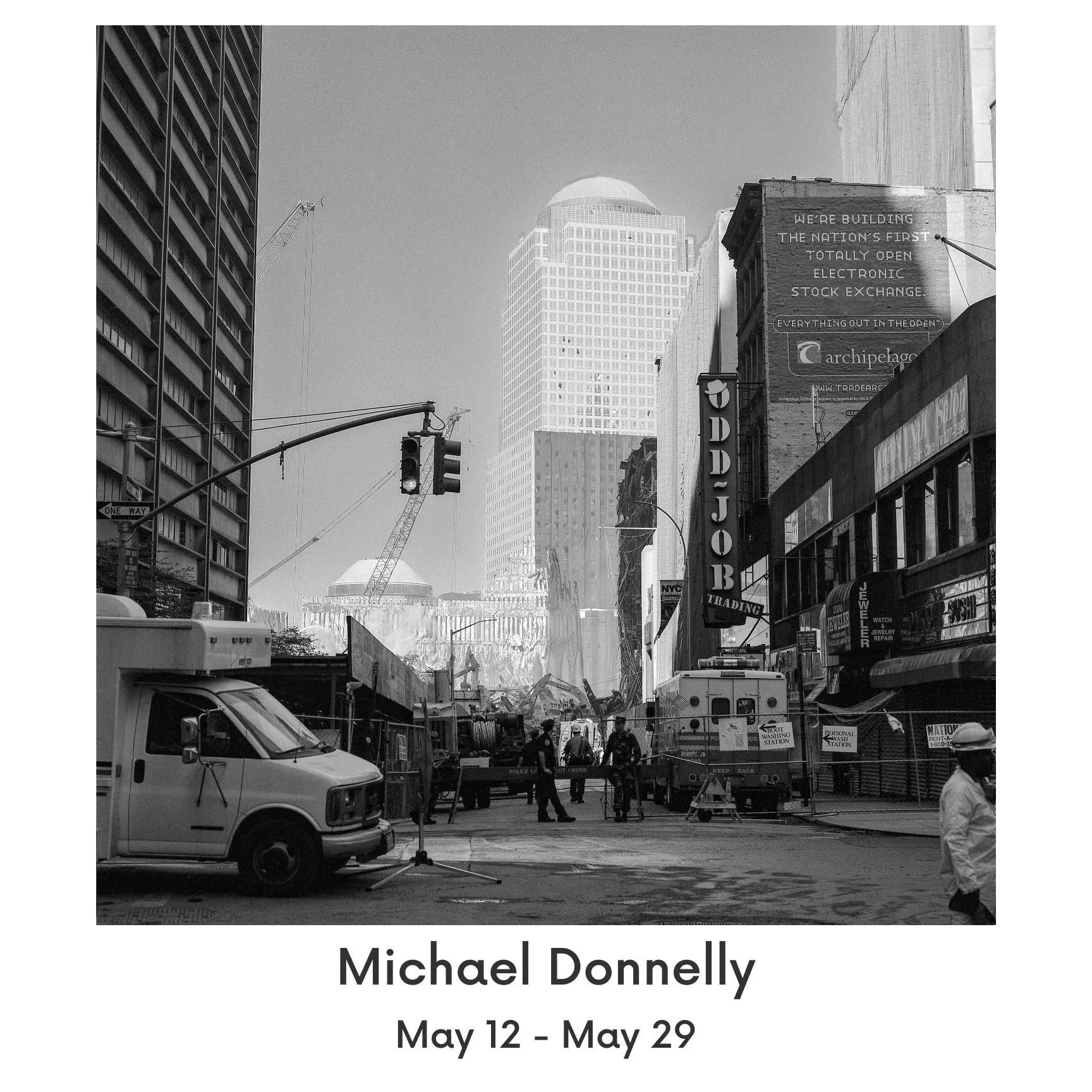 Black and White photography of street on 9/11 with text saying Michael Donnelly May 12 - May 29