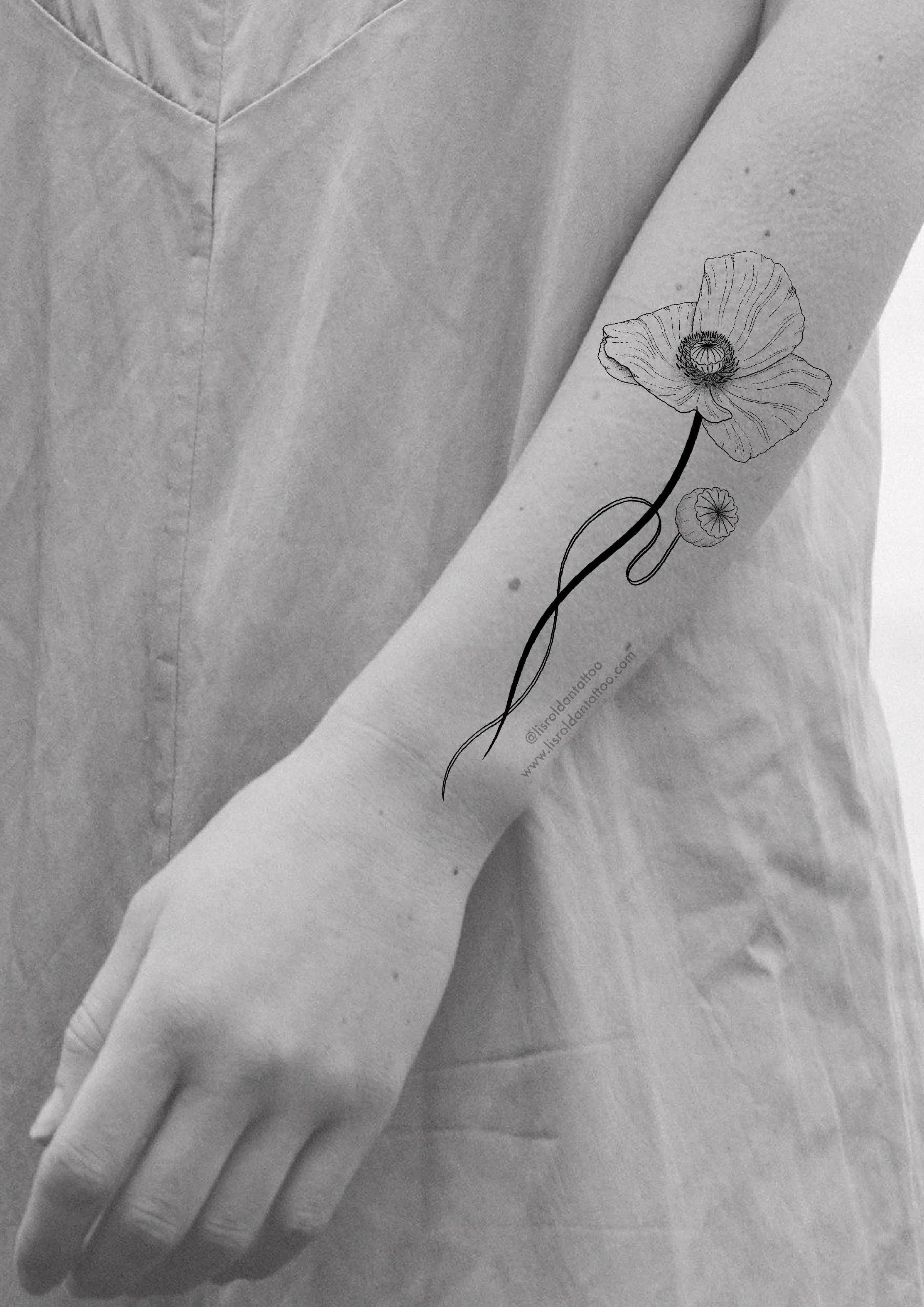 Minimalist forearm tattoo design by Lis Roldan featuring a delicate poppy flower in fine black lines, paired with a bold, flowing stem that follows the natural curve of the arm. The soft, paper-like petals contrast with the clean stem, creating a har