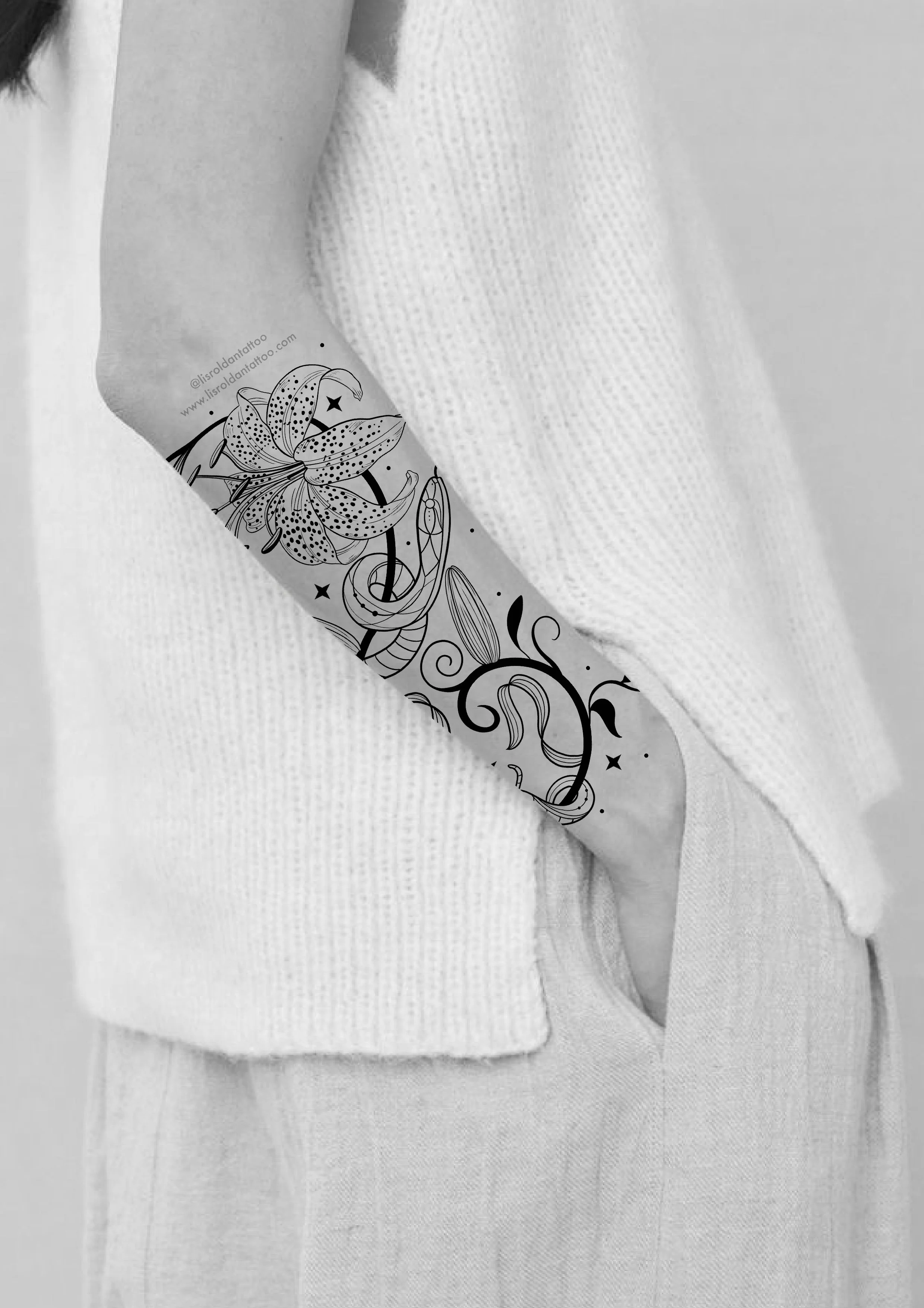 Forearm tattoo design by Lis Roldan featuring a detailed lily flower entwined with a graceful snake, surrounded by flowing lines and subtle botanical elements. This genderless tattoo design can be adapted to any body shape or placement, offering a bo
