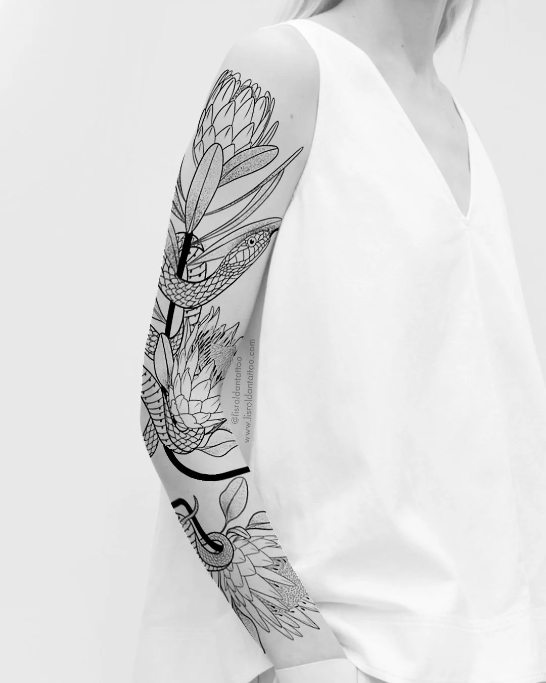 Protea flowers and snake tattoo design by Lis Roldan, symbolizing strength, transformation, and resilience. Designed to flow naturally around the arm, this genderless tattoo can be adapted to any body shape or placement for a unique, harmonious compo