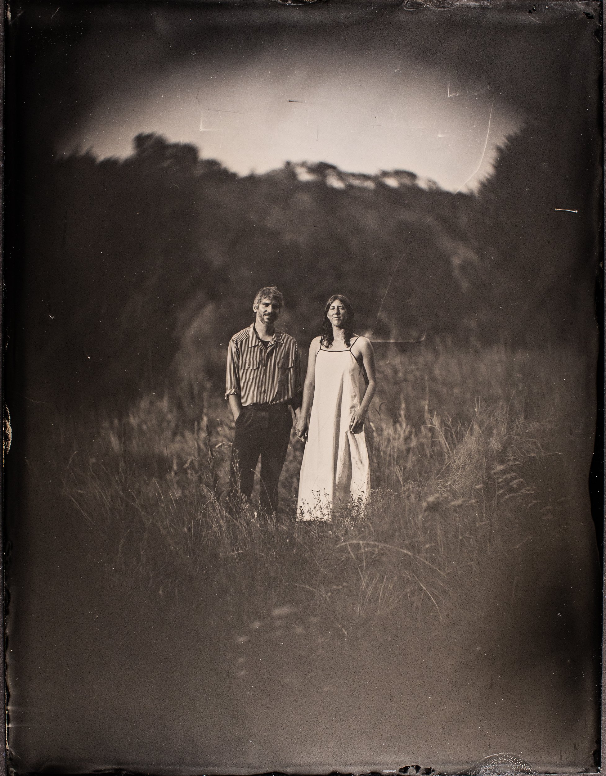 Bride and groom make tintypes at a wedding