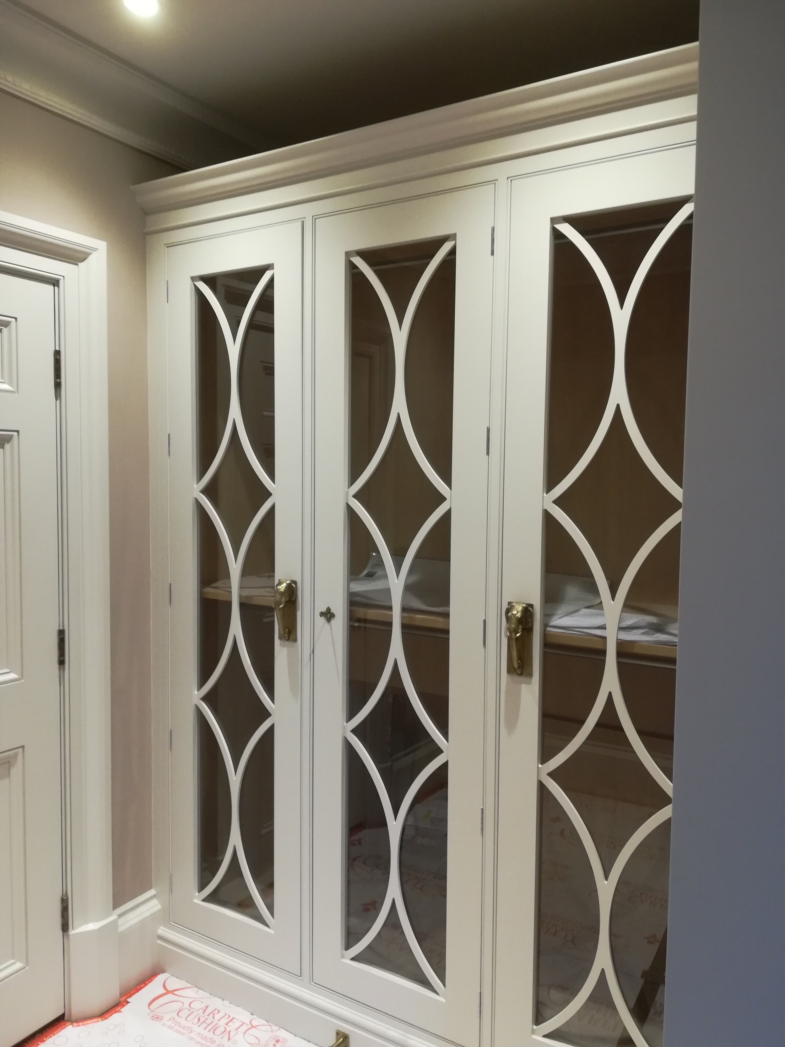 Clear glass panels with painted timber detailing
