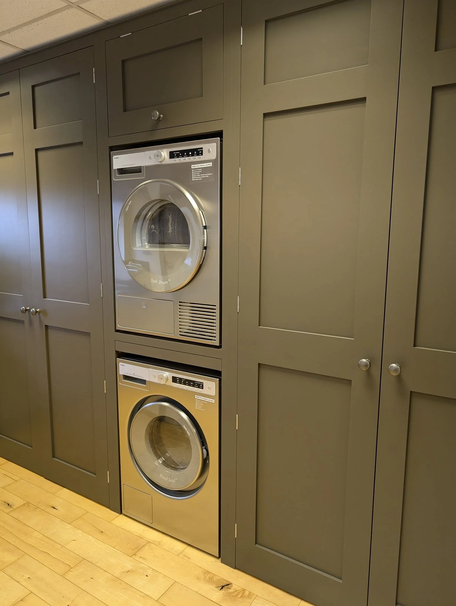 Showroom Display - Washer & Dryer stack with pull out laundry basket shelf (Asko washing machine & dryer)