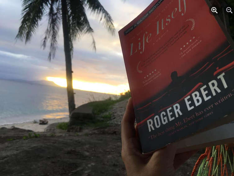 A beach, a rainbow, and so many sunsets