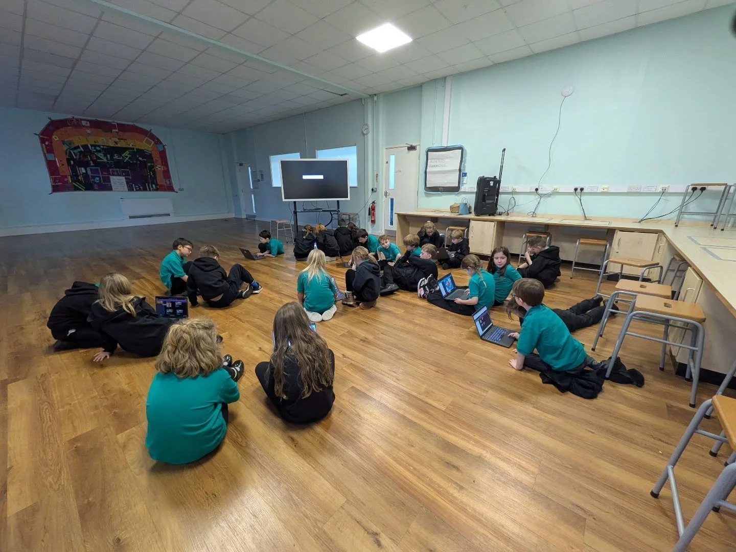Kingfishers getting to grips with coding using our laptops, learning about about not just how to code, but why game design is like being an author and considering what the experience is like for the players...