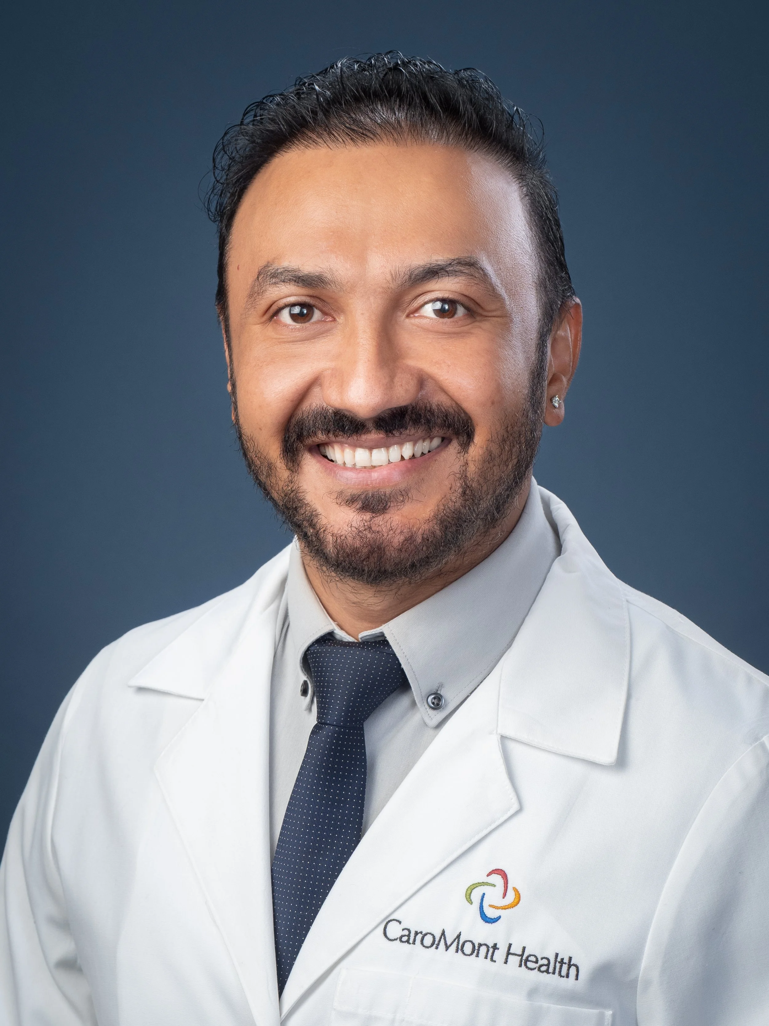 FY26_Headshot_Chhetri_Shankar_White Coat.jpg
